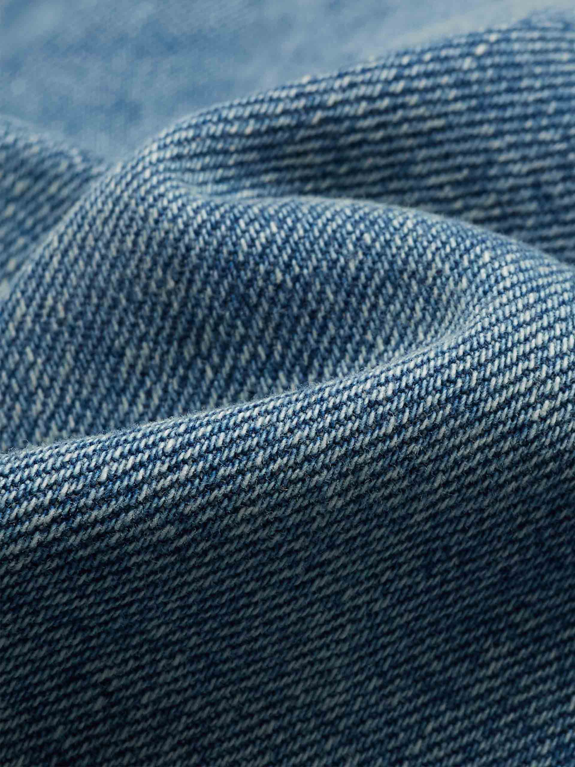 MO&Co.'s Raw Details Denim Shorts in Blue crafted from superior denim cotton, these pants boast subtle frayed hem detailing for an edgy, modern look.