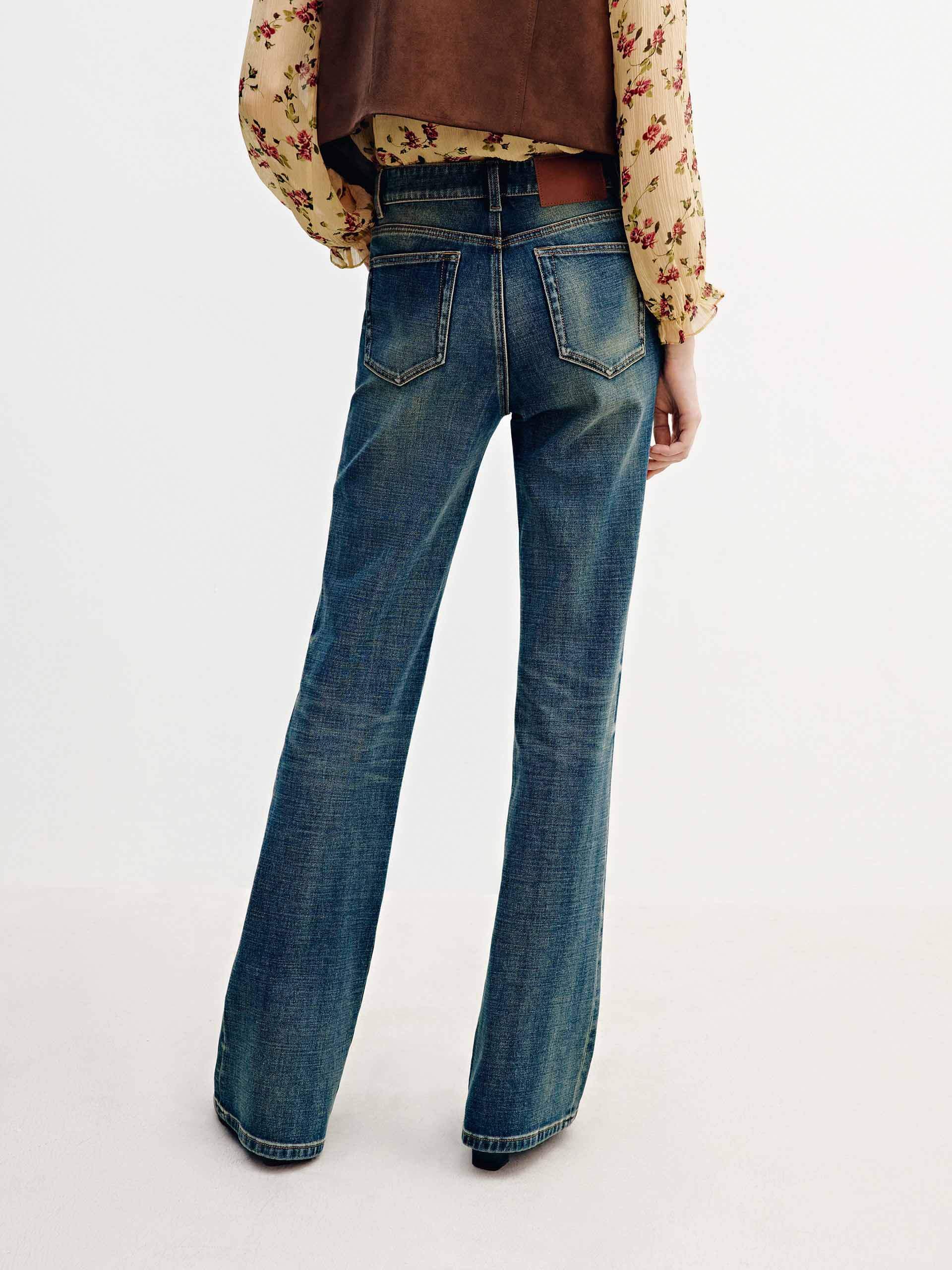MO&Co. Women's 70s Inspired Flared Jeans with Whisker Effect