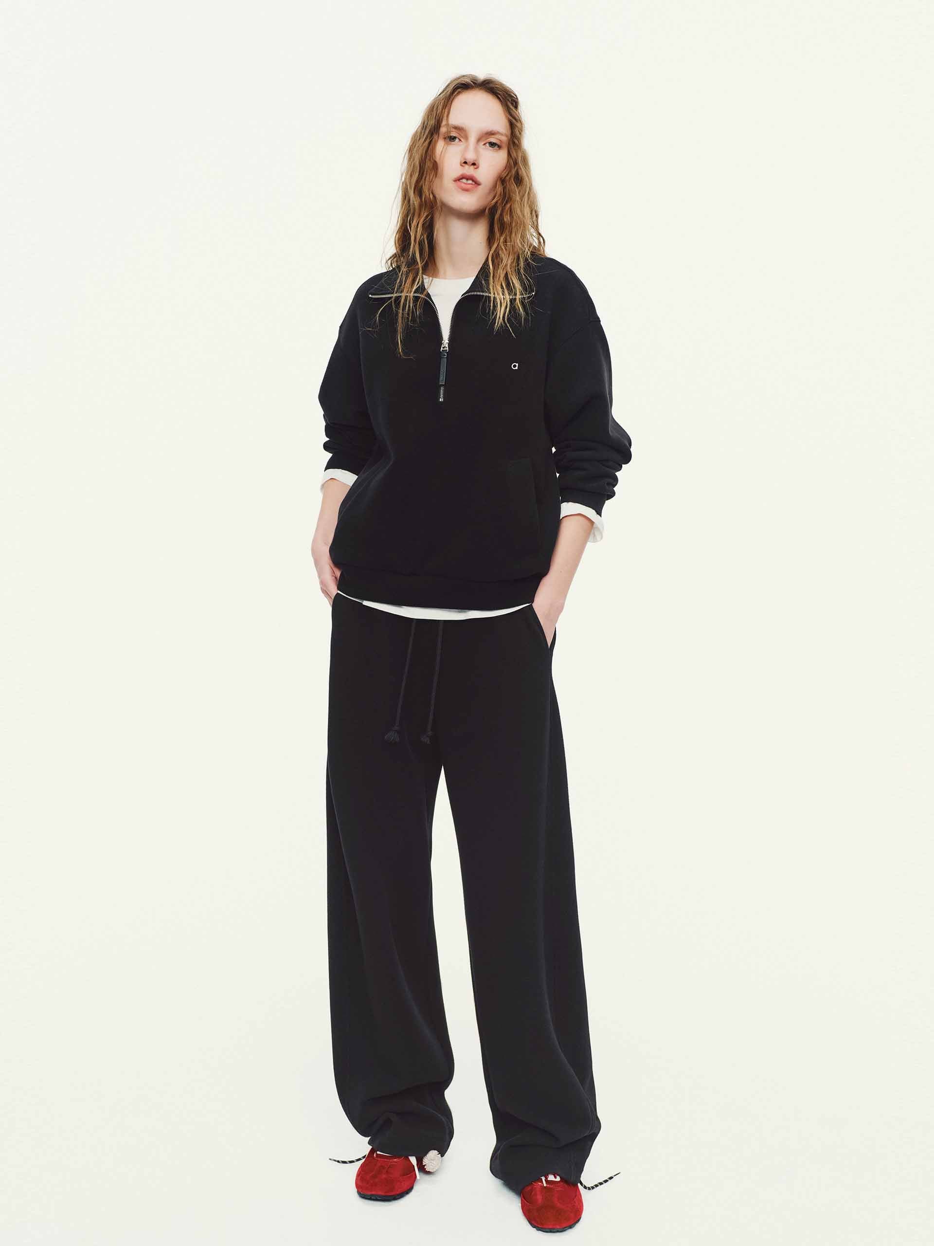 MO&Co. Drawstring Barrel Pants with Asymmetrical Seams in Black