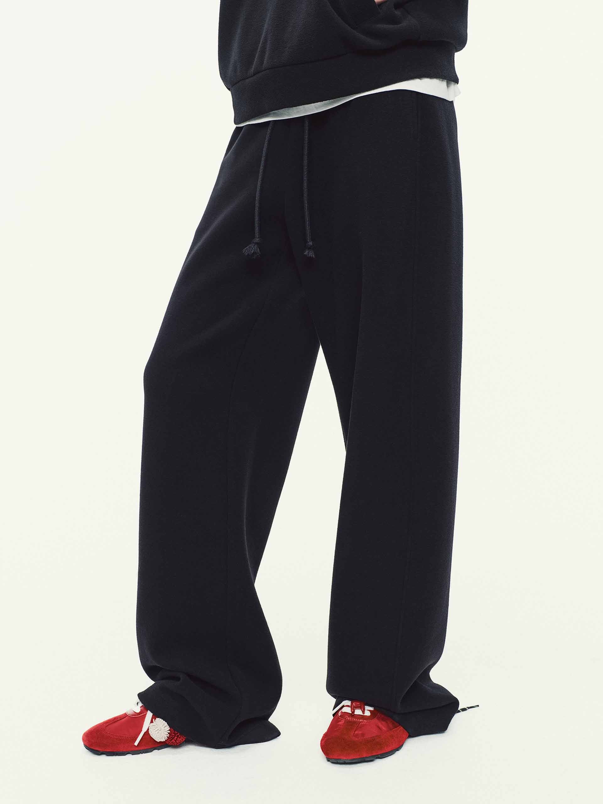 MO&Co. Drawstring Barrel Pants with Asymmetrical Seams in Black