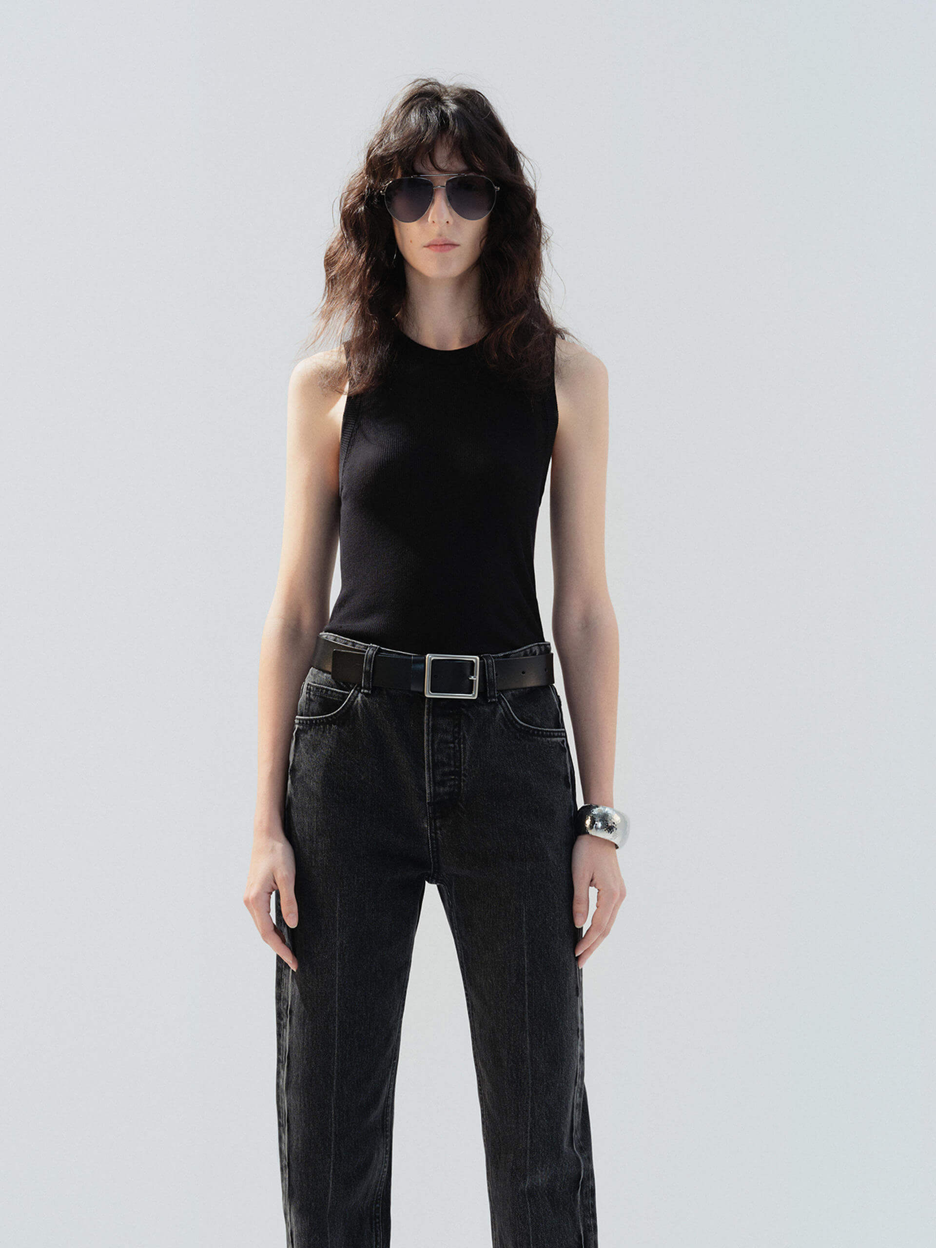 MO&Co. Noir Women's Black Ribbed Tank Top in Black | Versatile and Stylish crafted from a soft organic cotton-blend jersey with a slim stretchy ribbed tight fit.