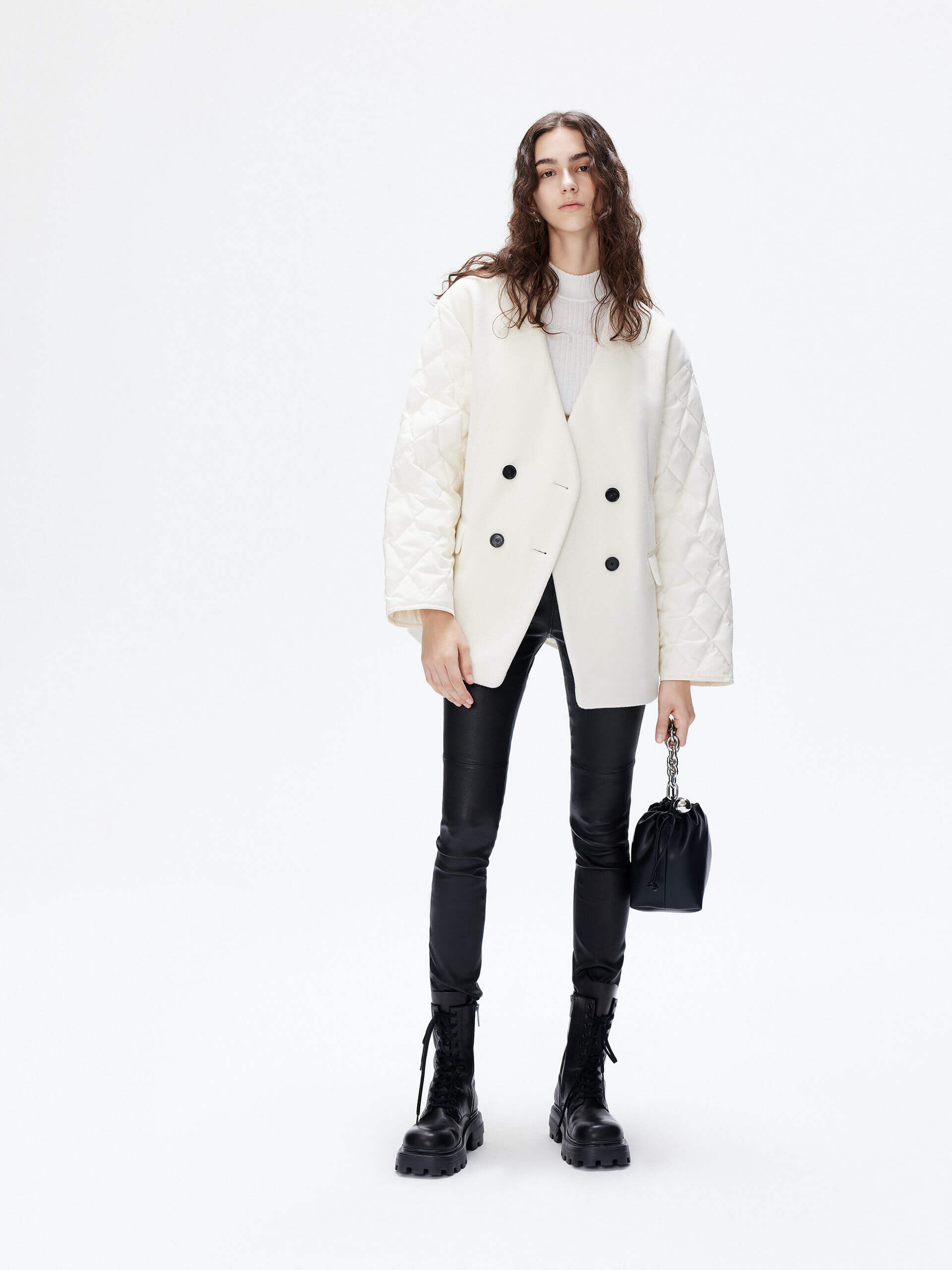 MO&Co. Women's V-neck Quilted Shell Wool Blend Jacket in White, featuring a button closure and flap pocket design. Wool panel front , quilted shell sleeves and back add a unique touch and extra warmth.