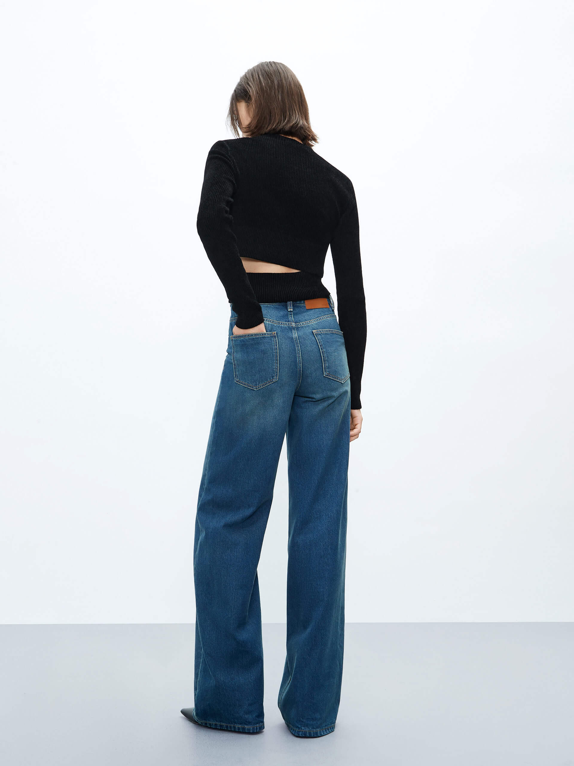 MO&Co. Women's Cross Front Tight Fit Cropped Ribbed Knit Top Long Sleeves in Black