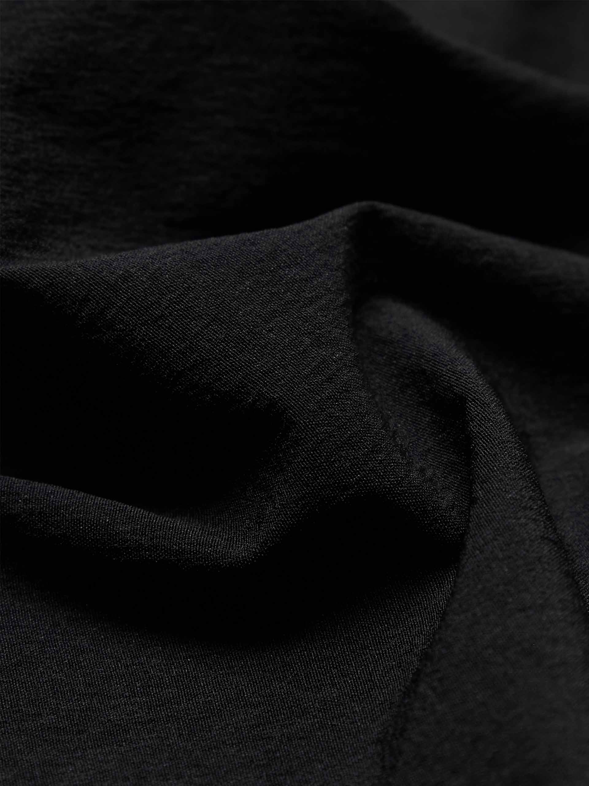 MO&Co. Women's Flowy Prairie Maxi Skirt in Black for Summer Day features double side pockets, cool-touch fabric, an elasticized waistband, and gathered seam details for a perfect fit.