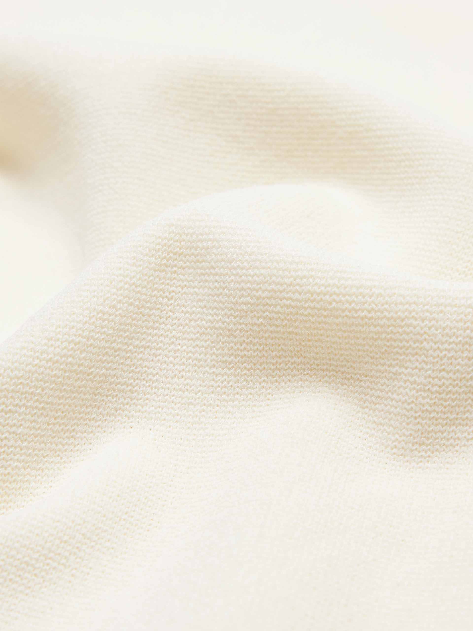 MO&Co. Women's Polo Collar Contrast Beige Dress features include a V-neck with collar design, contrasting trim details, and an embroidered M logo patch front.