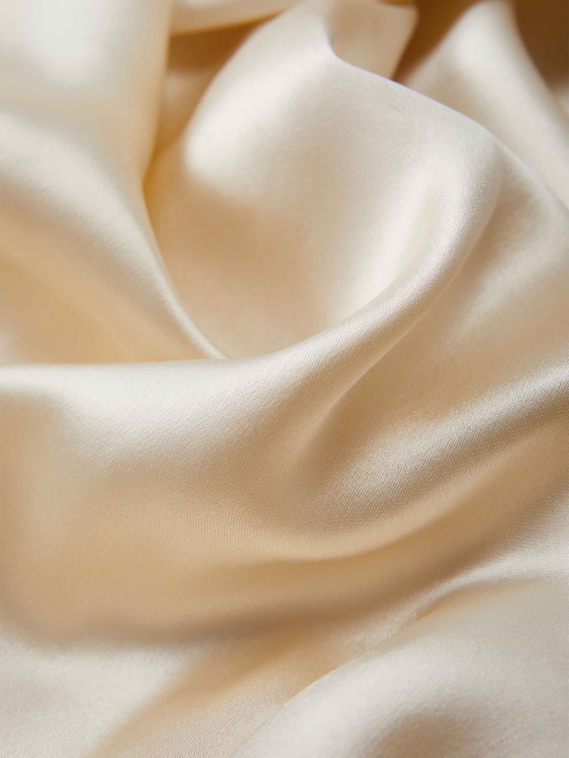 MO&Co. Women's Satin Acetate Blend Casual Track Jacket in Short Sleeves in Beige. Features: Loose fit, contrasting trim design, elasticized hem, side pockets & zip closure, and an acetate blend fabric for softness & comfort.