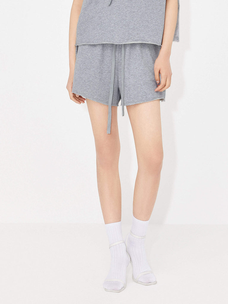 Stay in style and comfort with MO&Co.'s Women's Drawstring Waist Causal Shorts in Grey. Crafted from breathable cotton, the adjustable elastic waistband with drawstring provides a perfect fit every time, while the stylish double side pocket design allows for easy access to on-the-go items. Enjoy all-day comfort and style!