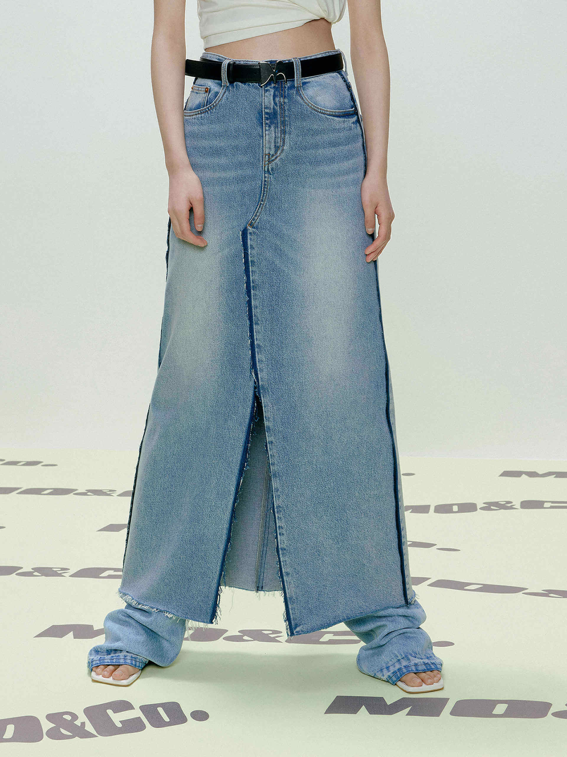 MO&Co. Women's Two-toned Seams Detail Slit Front Maxi Denim Skirt