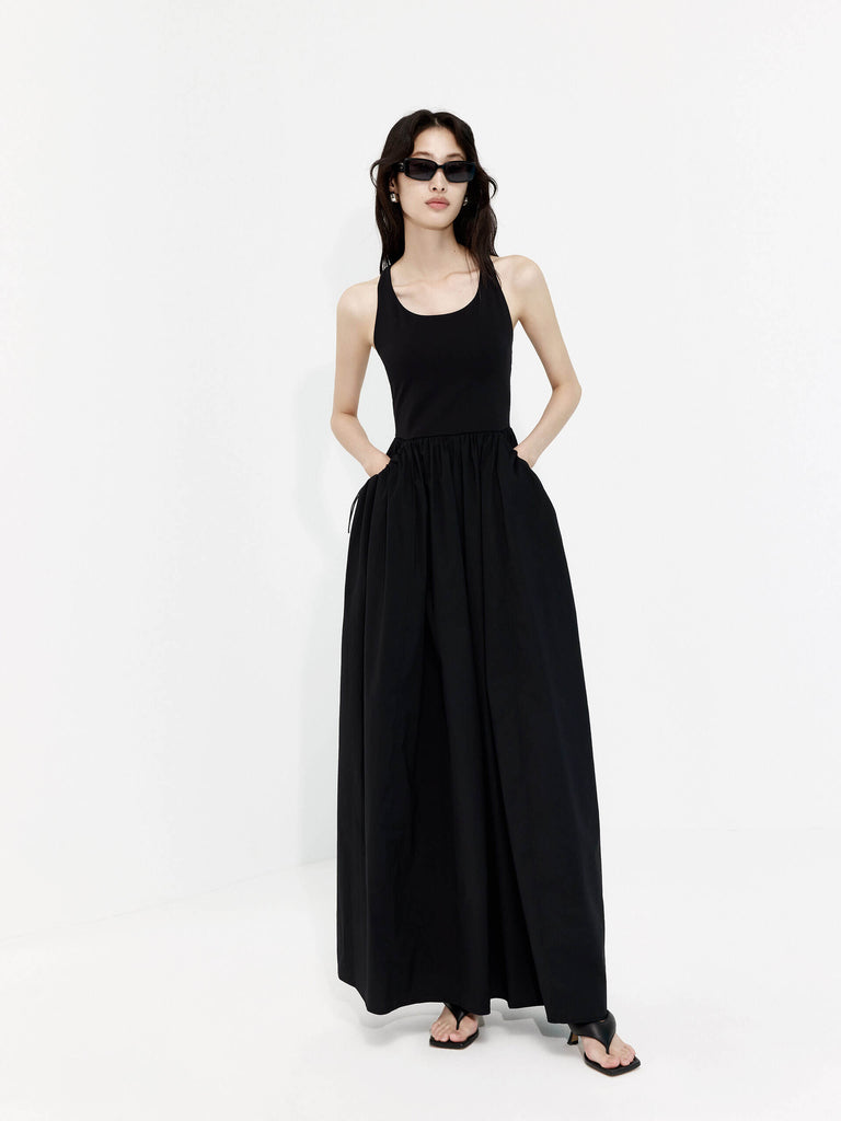 MO&Co. Women's Athleisure Contrast Panel Cutout Dress in Black features sleeveless, racerback silhouette and maxi length.