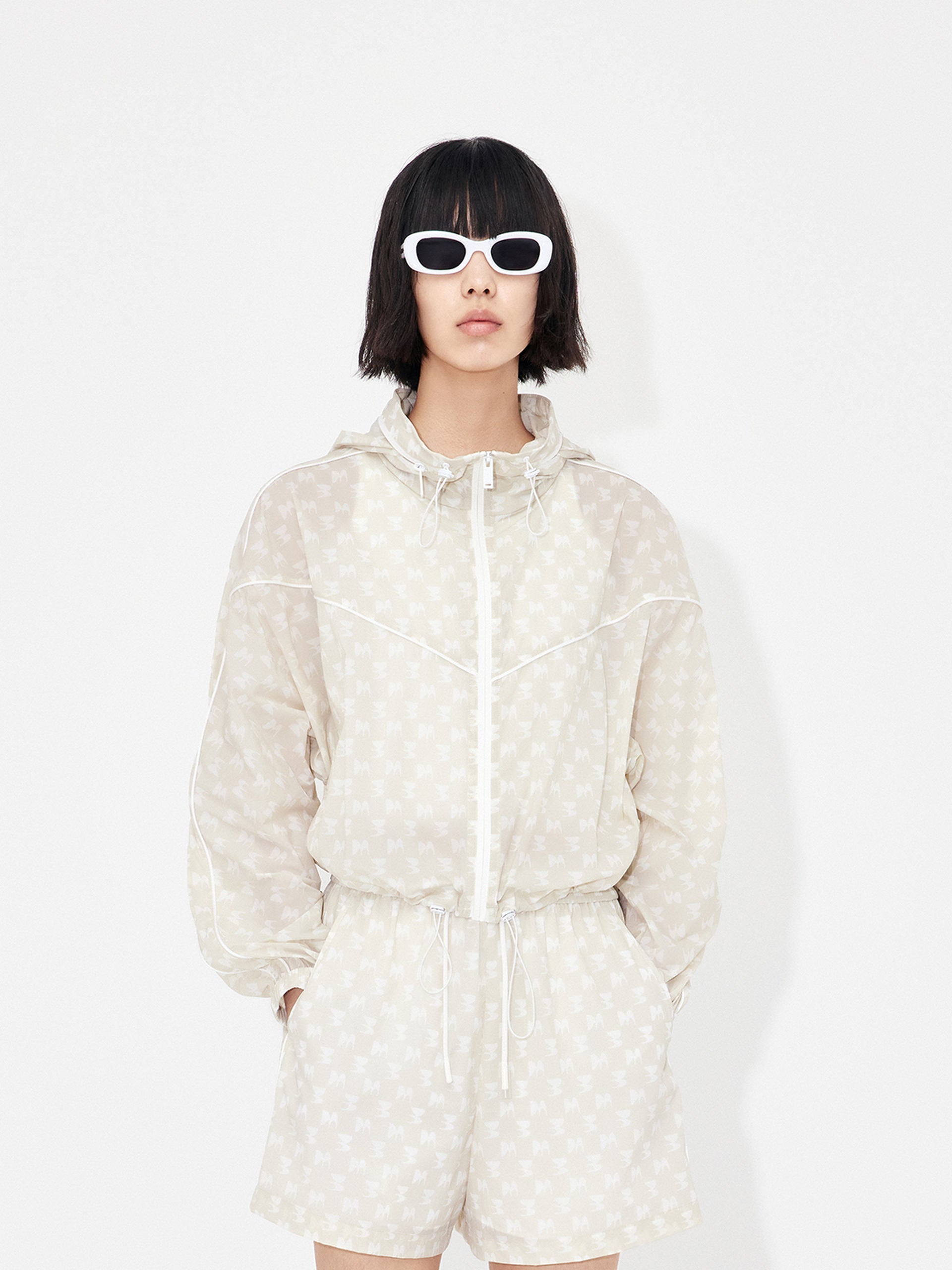 MO&Co. Women's Monogram Printed Sheer Sun Protection Lightweight Hoodie Jacket in Beige