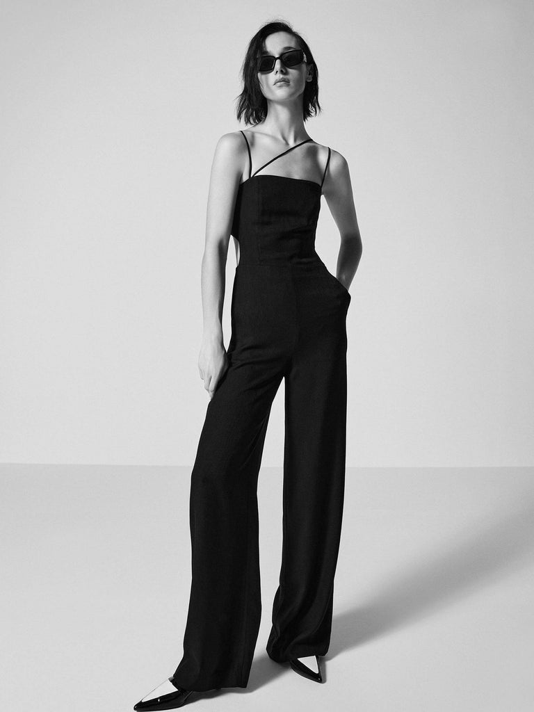 MO&Co. Women's Chic Cami Sleeveless Jumpsuit in Black with wide-leg, adjustable straps and cut-out back details