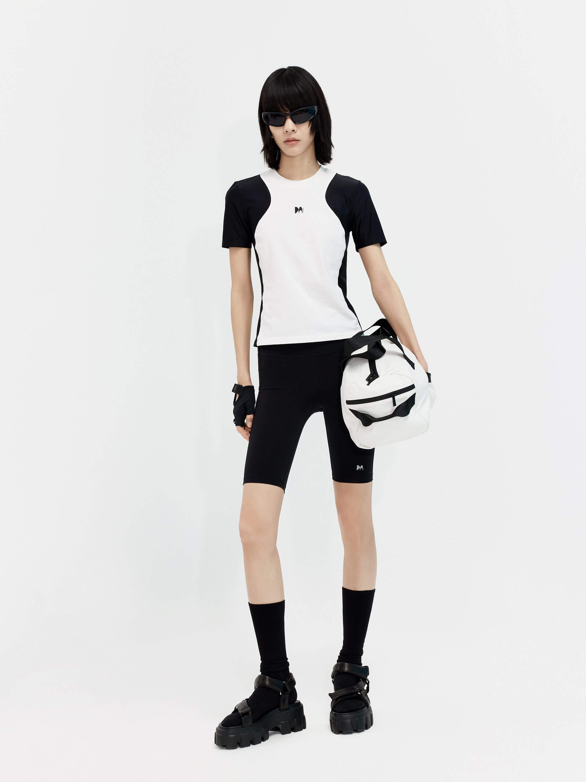 Try MO&Co.'s High Waist Sports Shorts in Black for women! These biker shorts hug your shape, thanks to stretchy material that moves with you. Plus, they feature a high rise with an elasticized waistband.