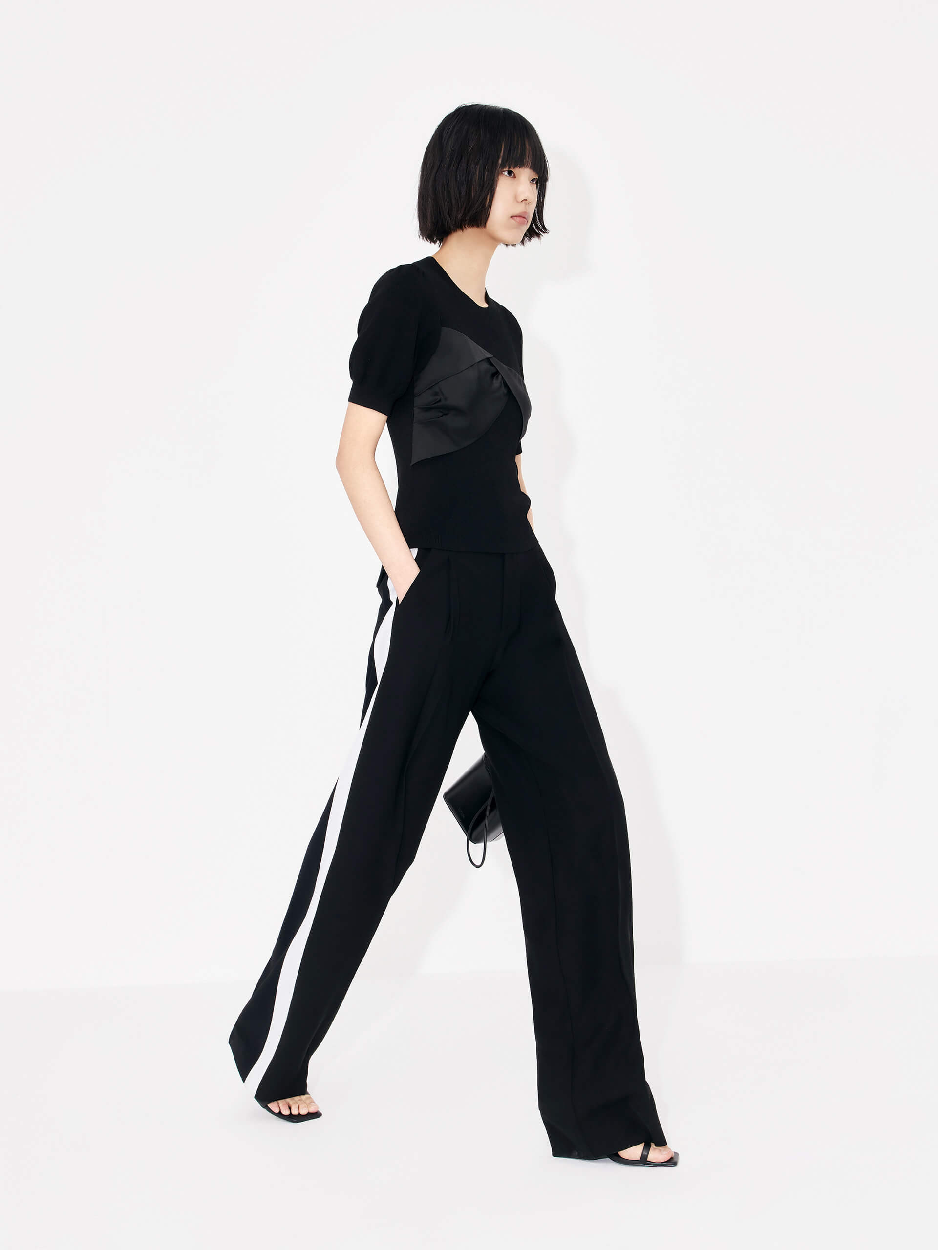 MO&Co. Women's Patch Detail Ribbed Top in Black with round neckline for casual looks and night out.