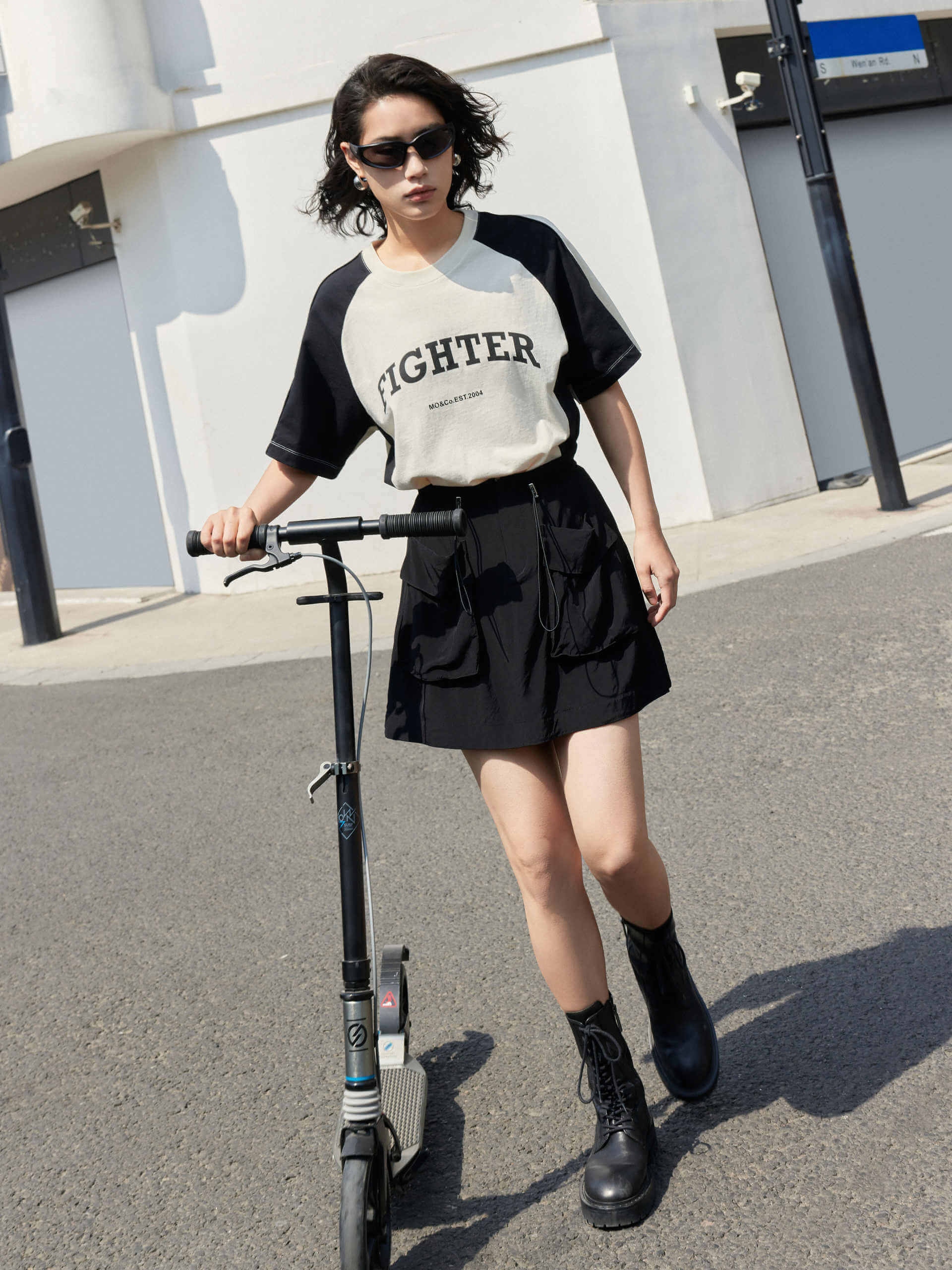 MO&Co. Women's Color Block Letter Print Relaxed Fit Cotton T-shirt in Beige featuring raglan sleeves with color block details, a letter print on the chest, the relaxed fit and crew neckline give you maximum comfort wherever you go.