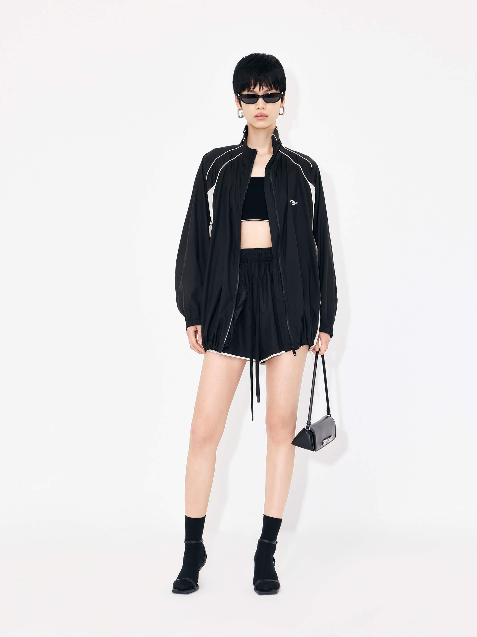 MO&Co. Women's Elastic Contrasting Lightweight Sporty Track Shorts in Black