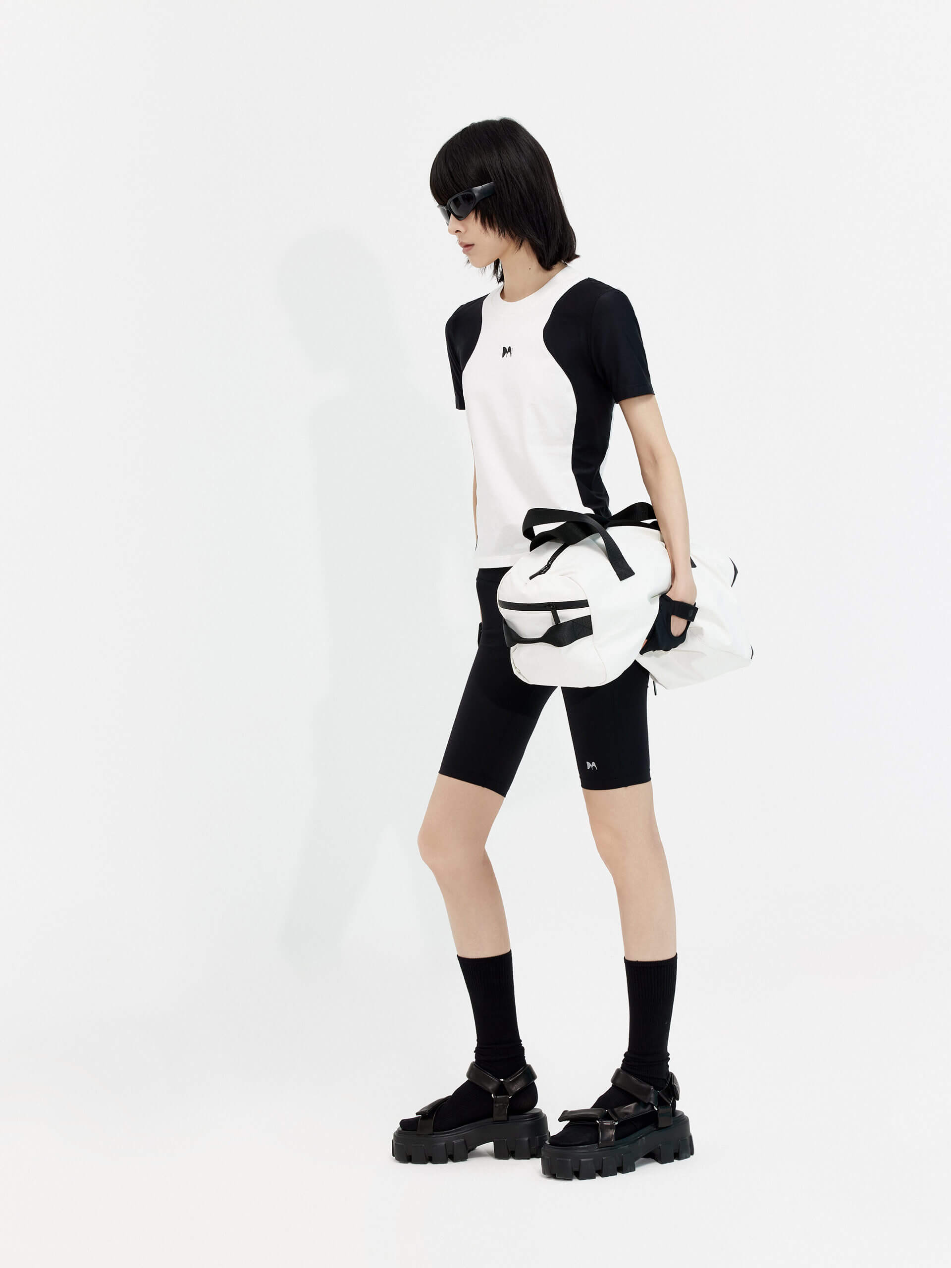 Try MO&Co.'s High Waist Sports Shorts in Black for women! These biker shorts hug your shape, thanks to stretchy material that moves with you. Plus, they feature a high rise with an elasticized waistband.