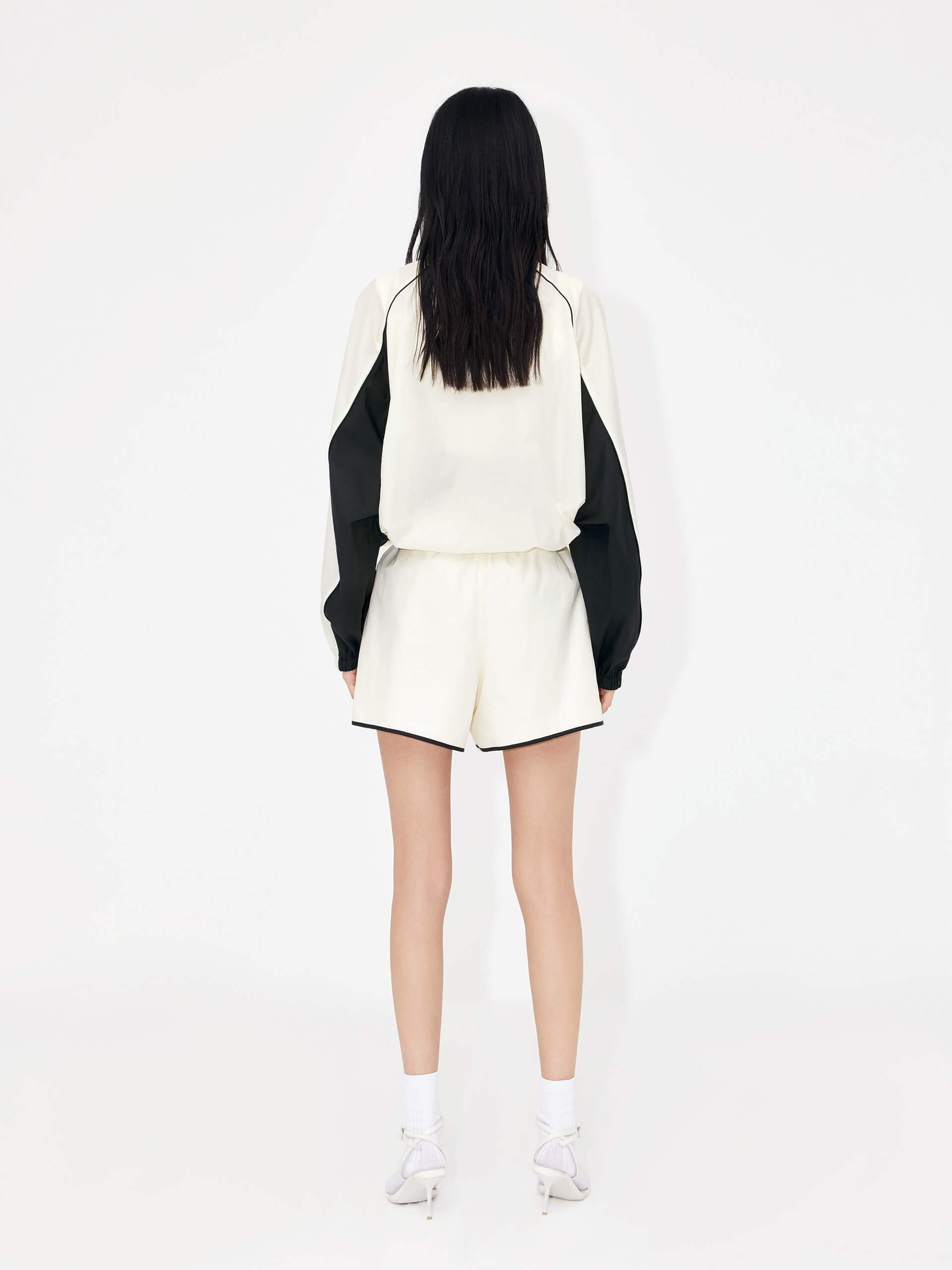 MO&Co. Women's Elastic Contrasting Lightweight Sporty Track Shorts in Beige