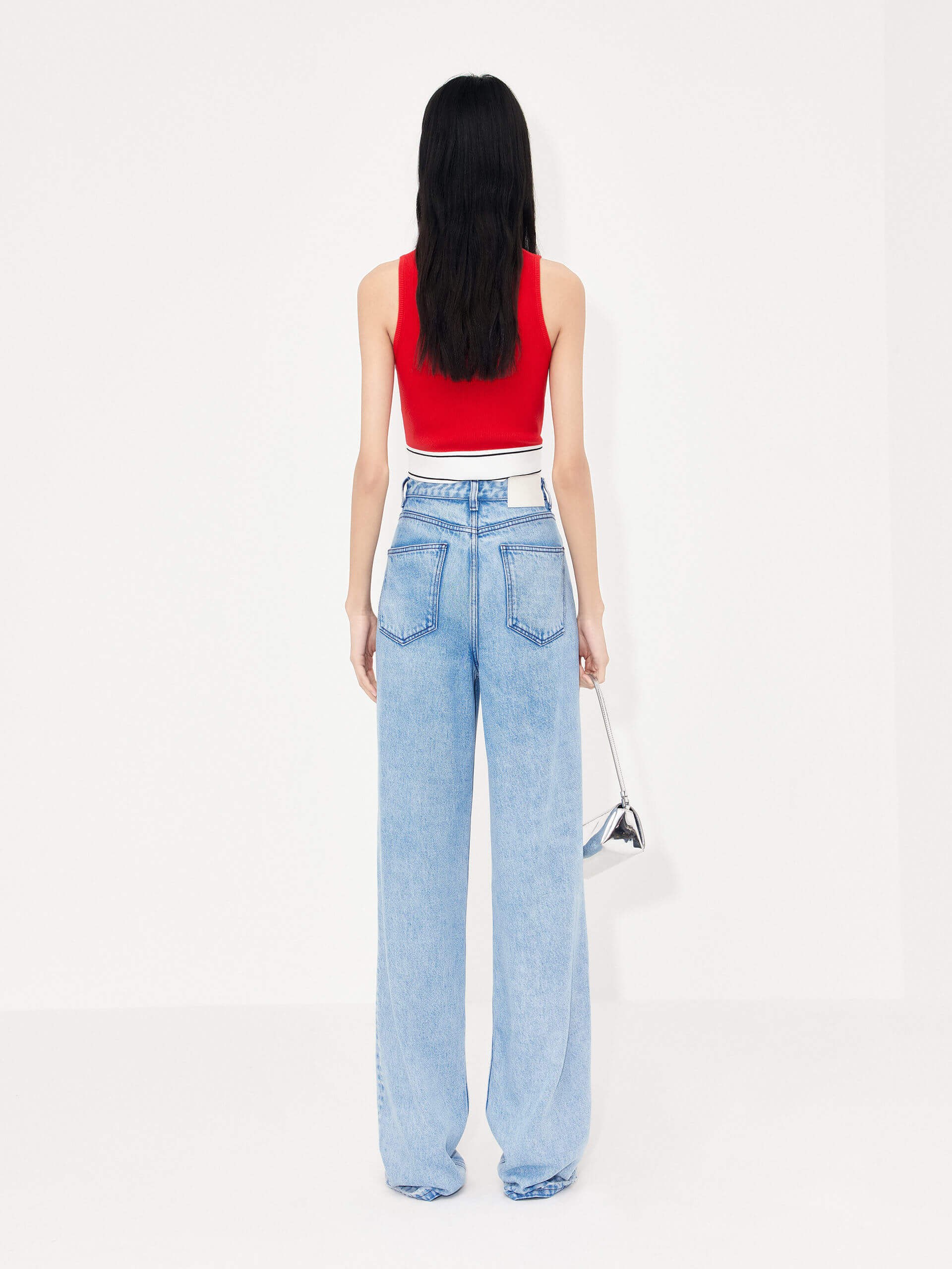 MO&Co. Women's Full Length Straight Light Blue Jeans. Craft from eco-friendly material lyocell, the jeans features high waist, light blue wash effect, wide and straight fit.