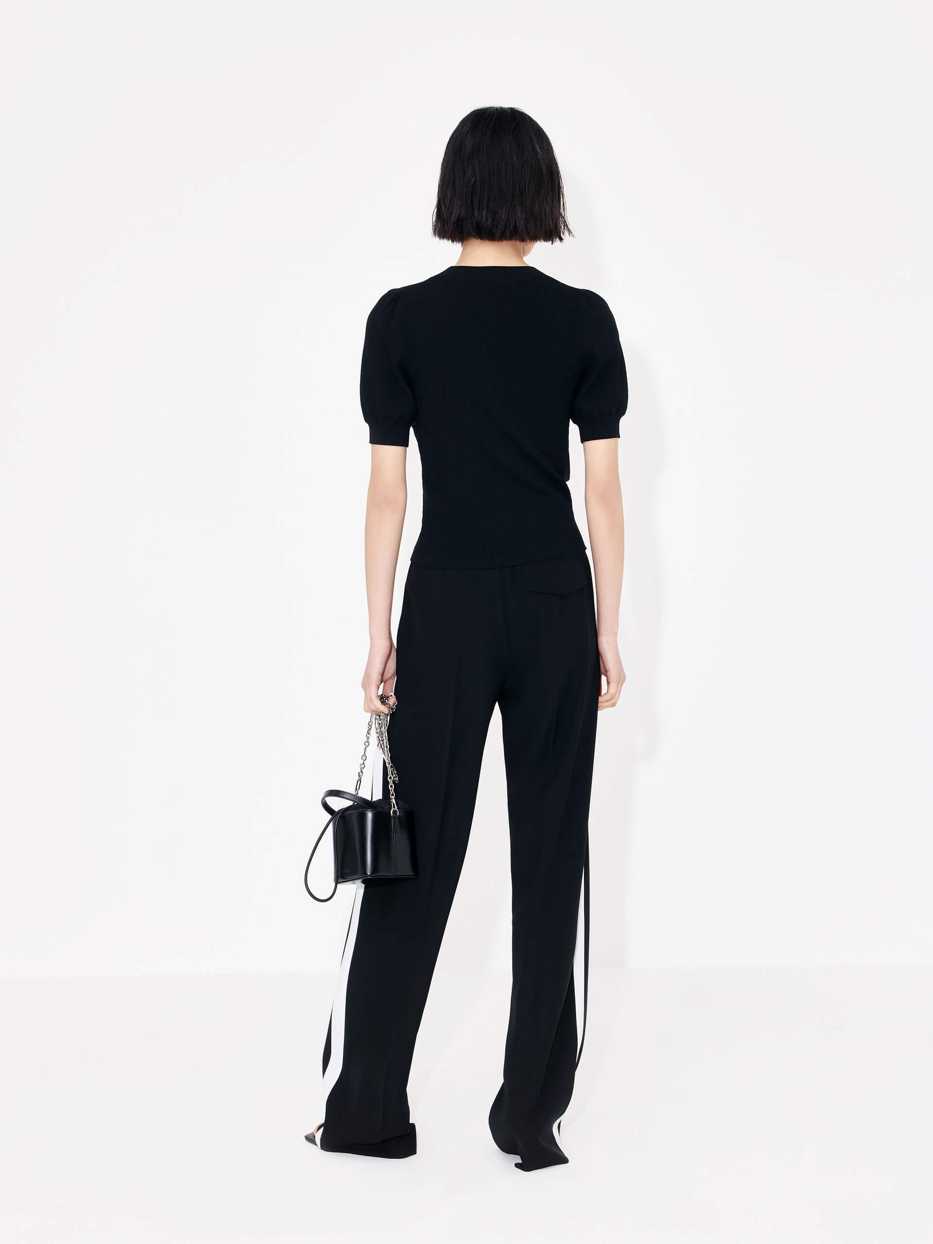 MO&Co. Women's Patch Detail Ribbed Top in Black with round neckline for casual looks and night out.