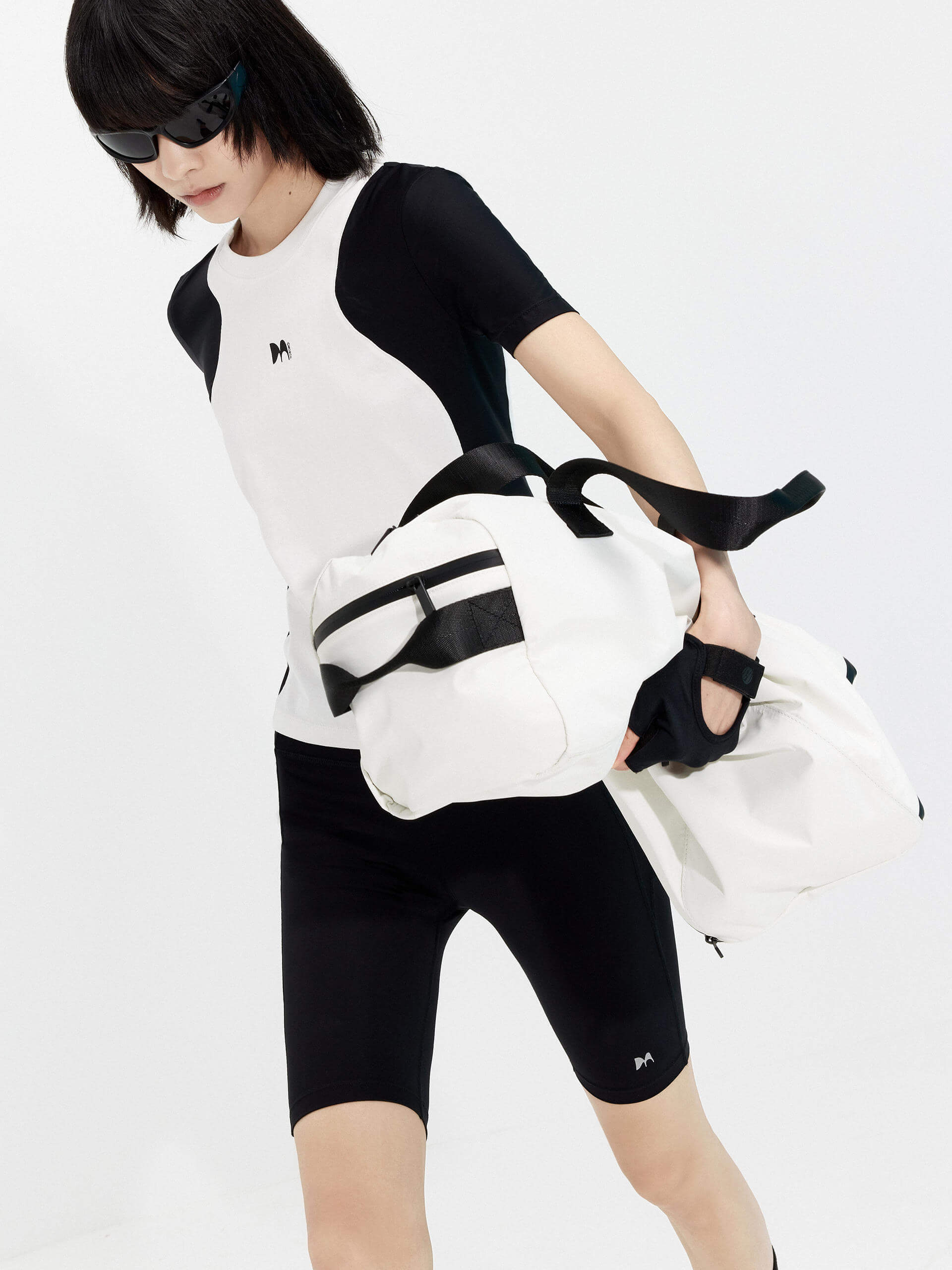 Try MO&Co.'s High Waist Sports Shorts in Black for women! These biker shorts hug your shape, thanks to stretchy material that moves with you. Plus, they feature a high rise with an elasticized waistband.