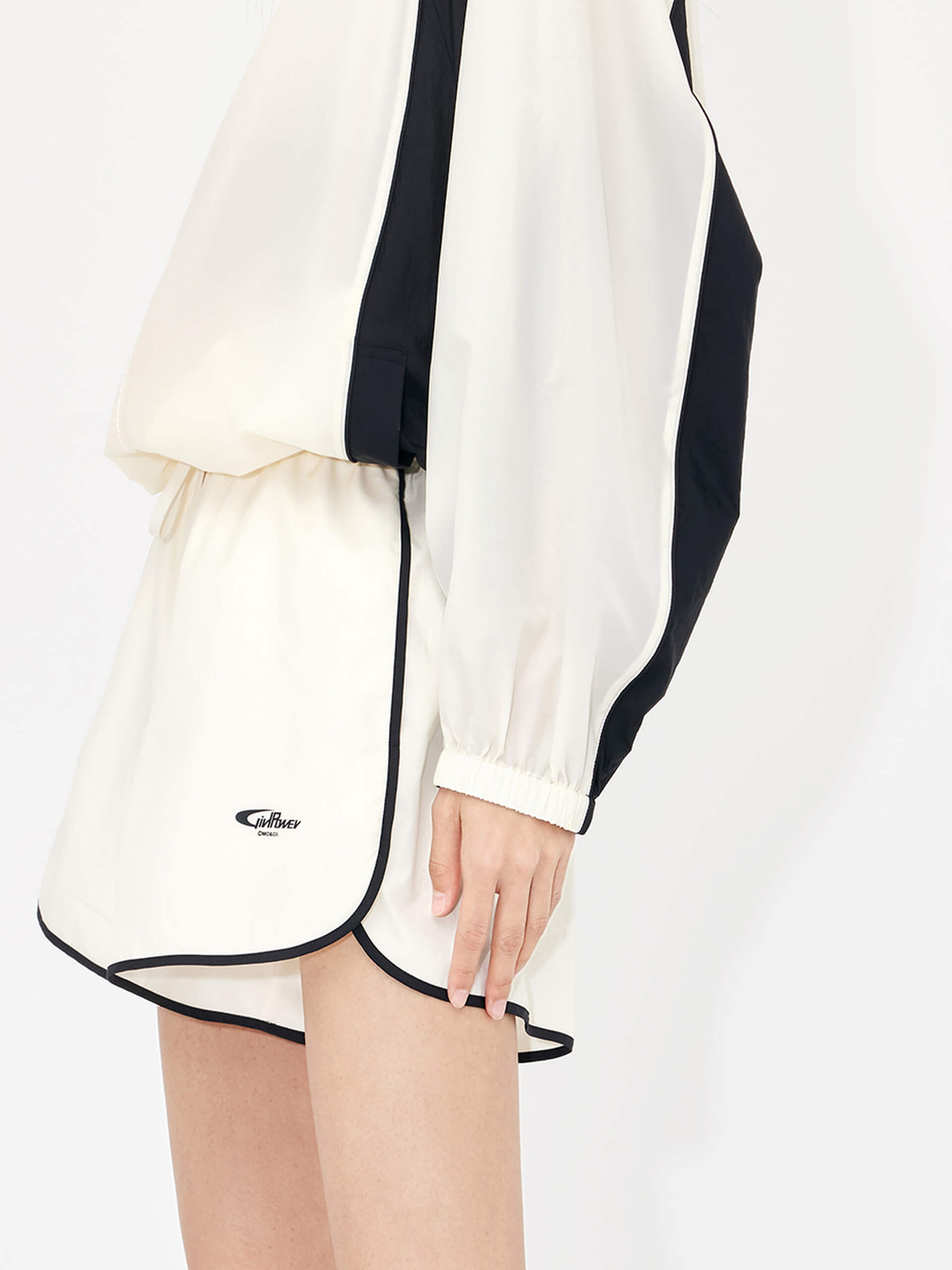 MO&Co. Women's Elastic Contrasting Lightweight Sporty Track Shorts in Beige