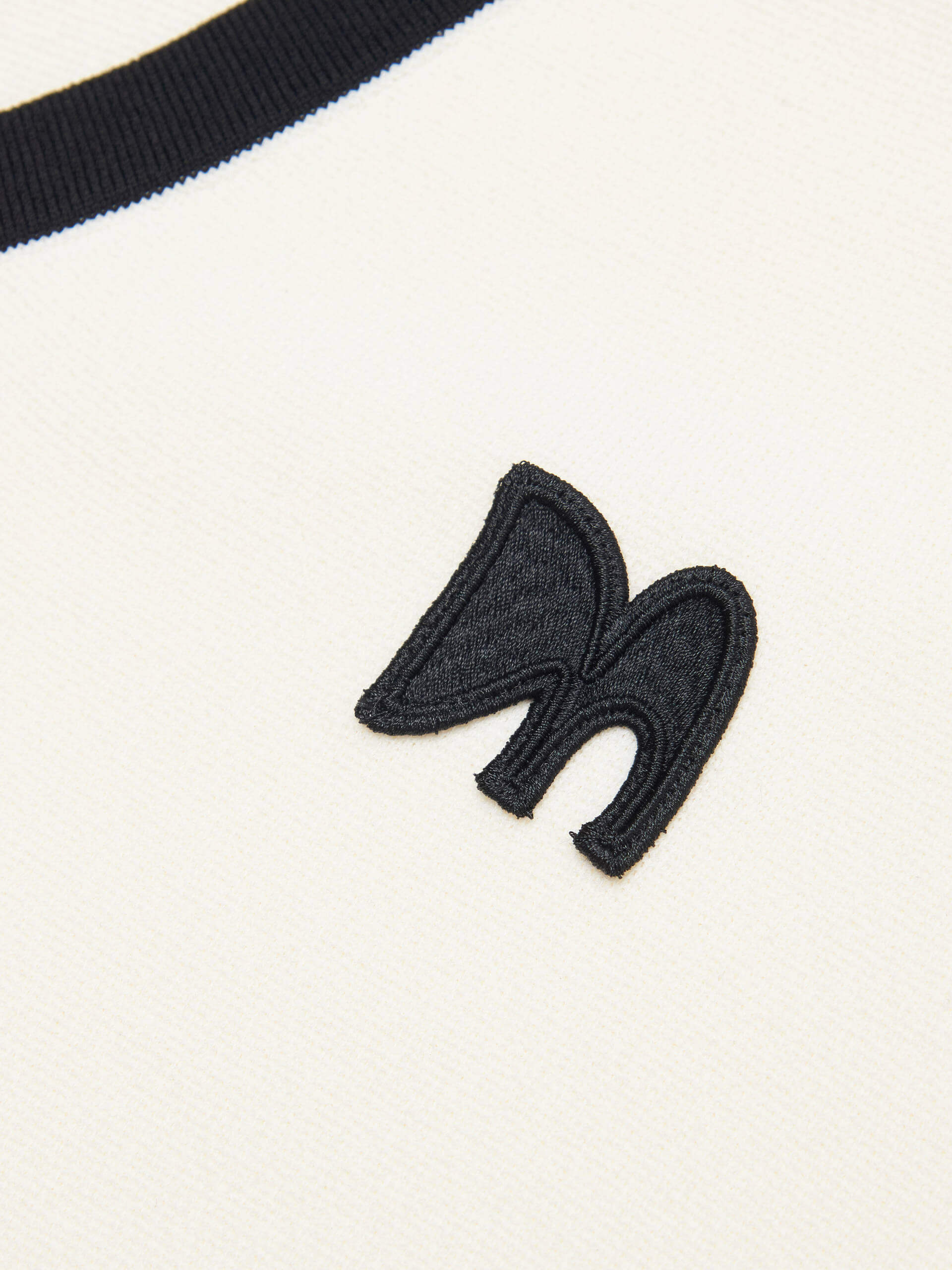 MO&Co. Women's Polo Collar Contrast Beige Dress features include a V-neck with collar design, contrasting trim details, and an embroidered M logo patch front.