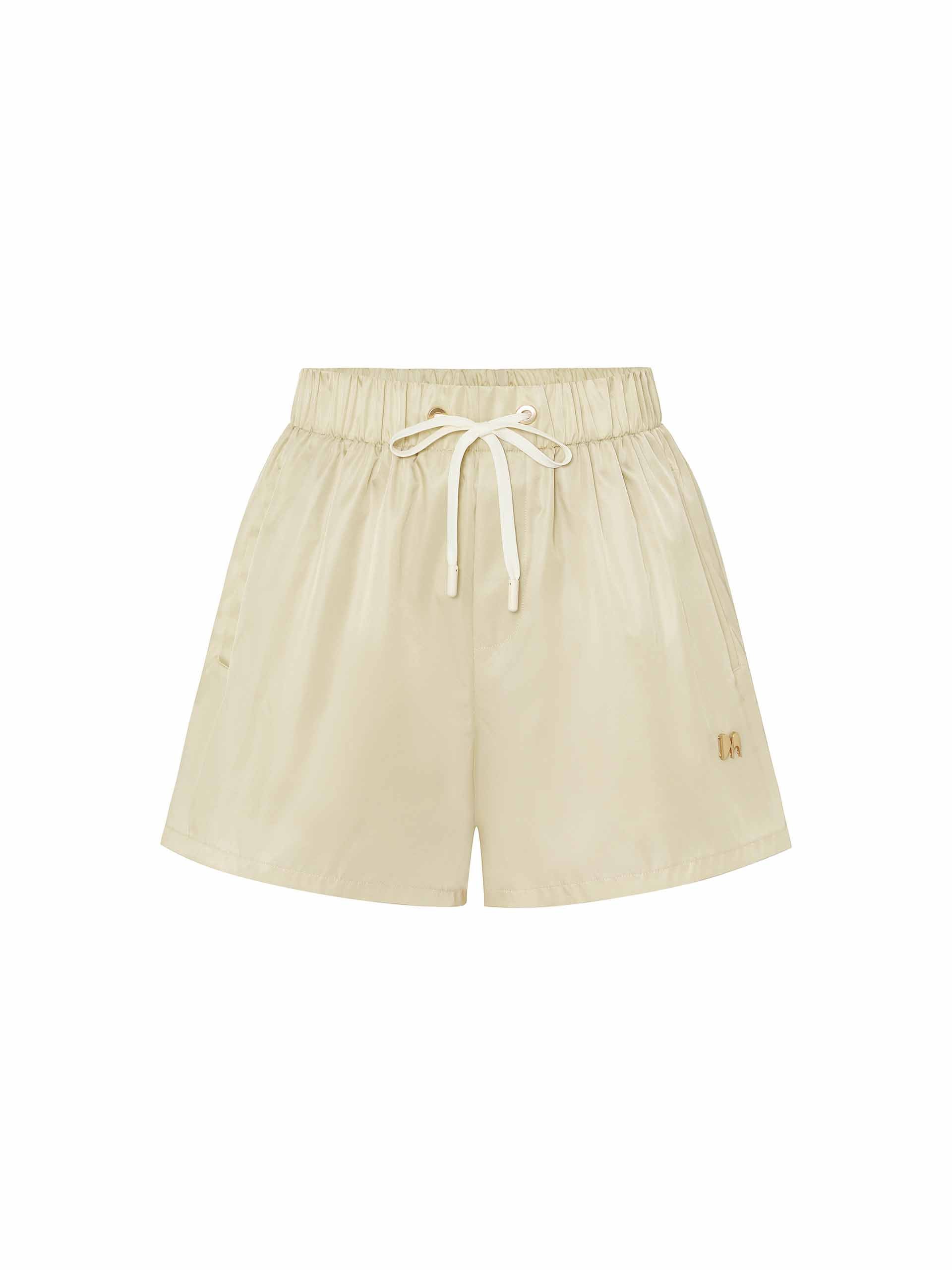 MO&Co. Women's Drawstring Elastic Waist Logo Shorts in Yellow