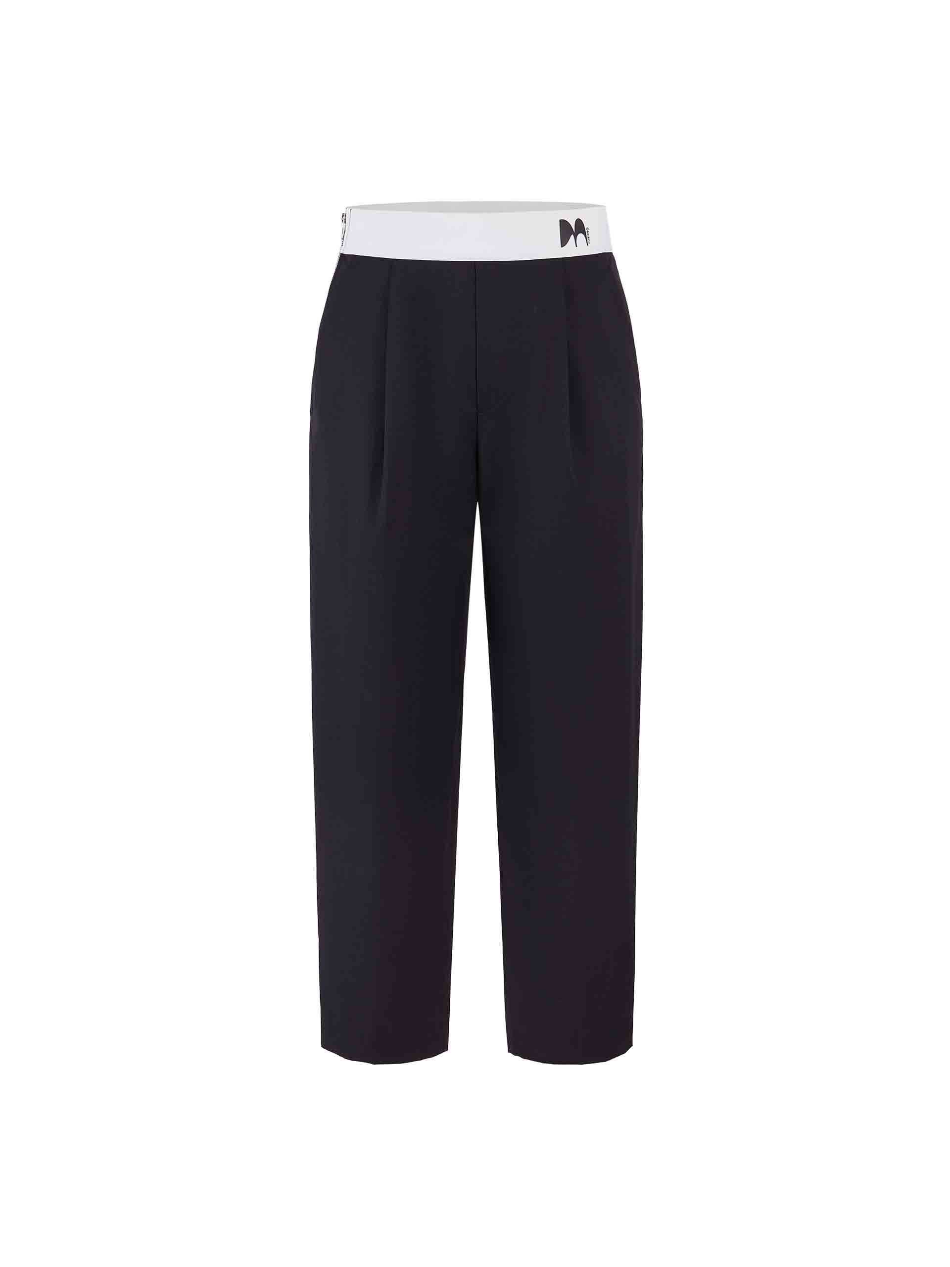 MO&Co. Women's Contrasting Details Suit Pants in Black. Crafted with a luxurious wool blend and featuring an eye-catching elastic waistband with an M pattern, these pants are designed for comfort and style. Double-side pockets and side zip closure complete the look.