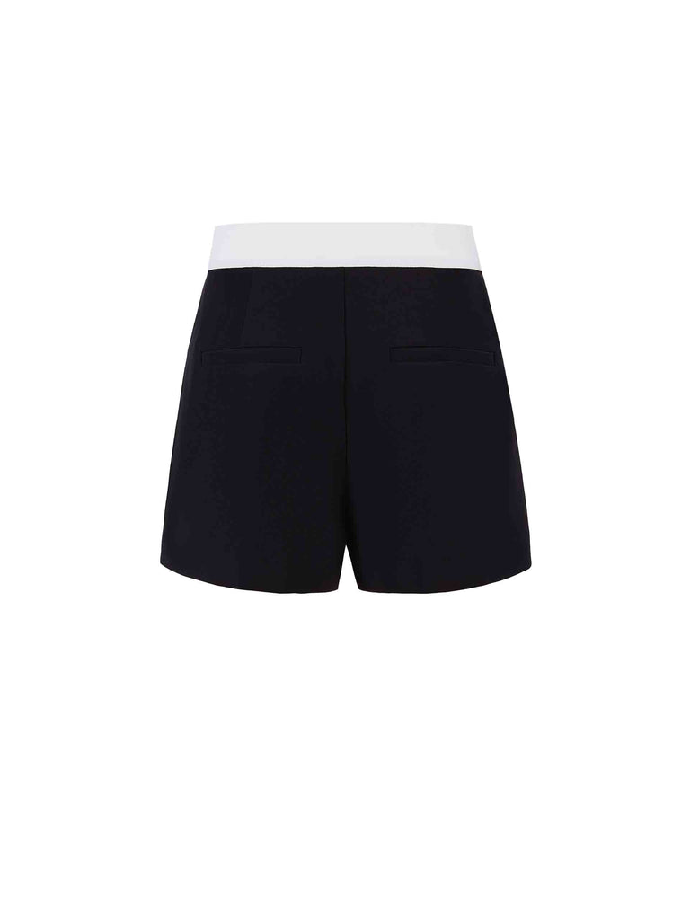 MO&Co.'s Contrasting Waistband Detail Shorts. This lightweight and soft design features a contrast waistband and double side pockets with a side zipper closure.