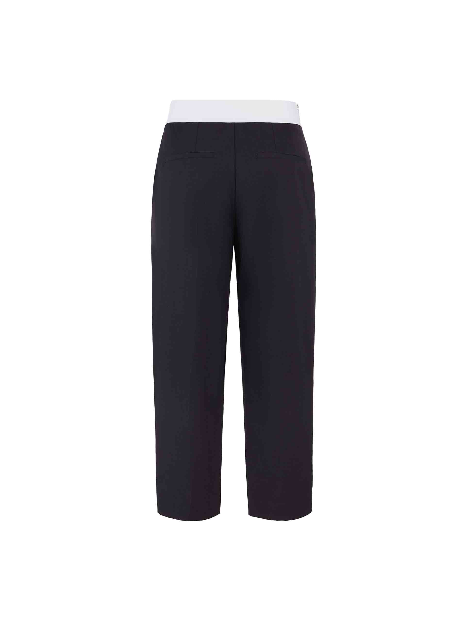 MO&Co. Women's Contrasting Details Suit Pants in Black. Crafted with a luxurious wool blend and featuring an eye-catching elastic waistband with an M pattern, these pants are designed for comfort and style. Double-side pockets and side zip closure complete the look.