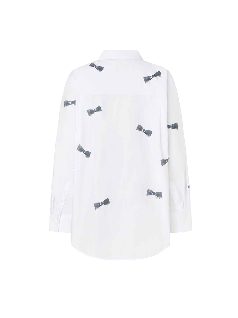 MO&Co. Women's Bowknot Pattern Cotton Shirt in White, with its all-over bowknot print design, comfortable cotton material and loose fit.