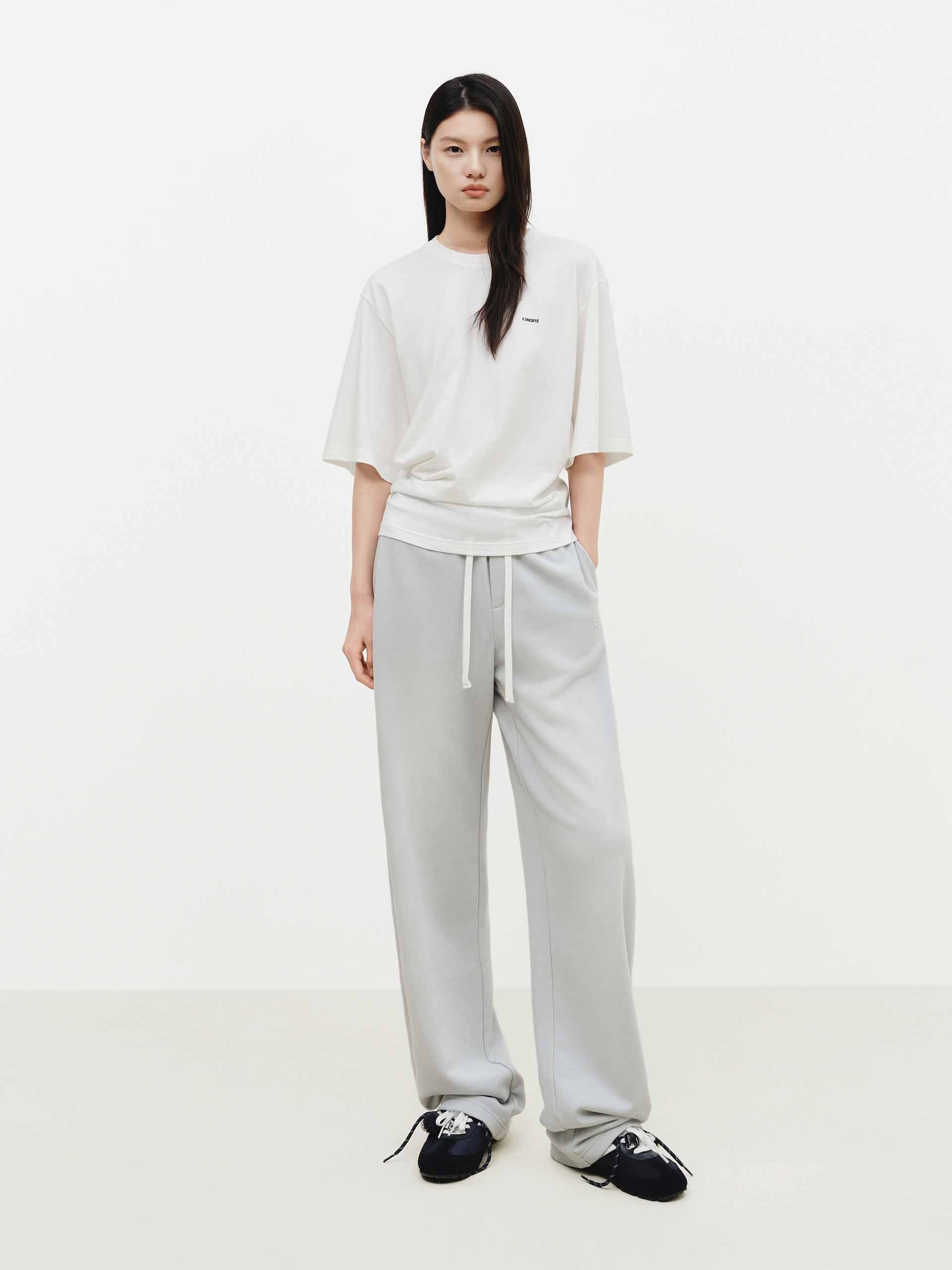 MO&Co. Fitted Cotton Blend Tee with Side Waist Pleat in White