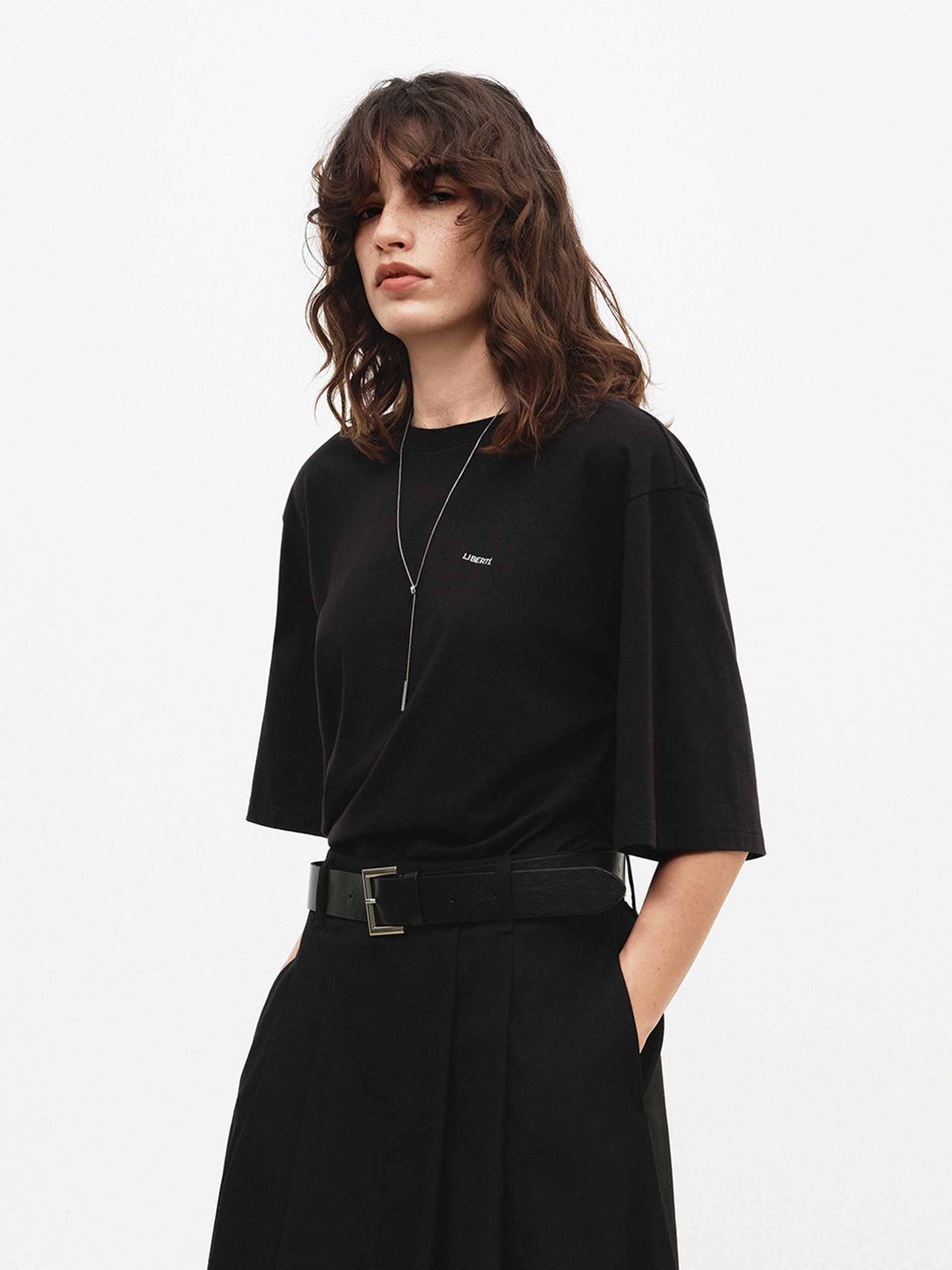 MO&Co. Fitted Cotton Blend Tee with Side Waist Pleat in Black