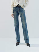 MO&Co. Noir Women's High Rise Full Length Cotton Blue Straight Jeans feature a regular fit and loose, straight legs for a relaxed look.