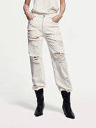 MO&Co. Noir Women's Destroyed Straight Leg Jeans. Crafted from soft Turkish cotton, these jeans feature a flattering mid-rise and straight leg silhouette.