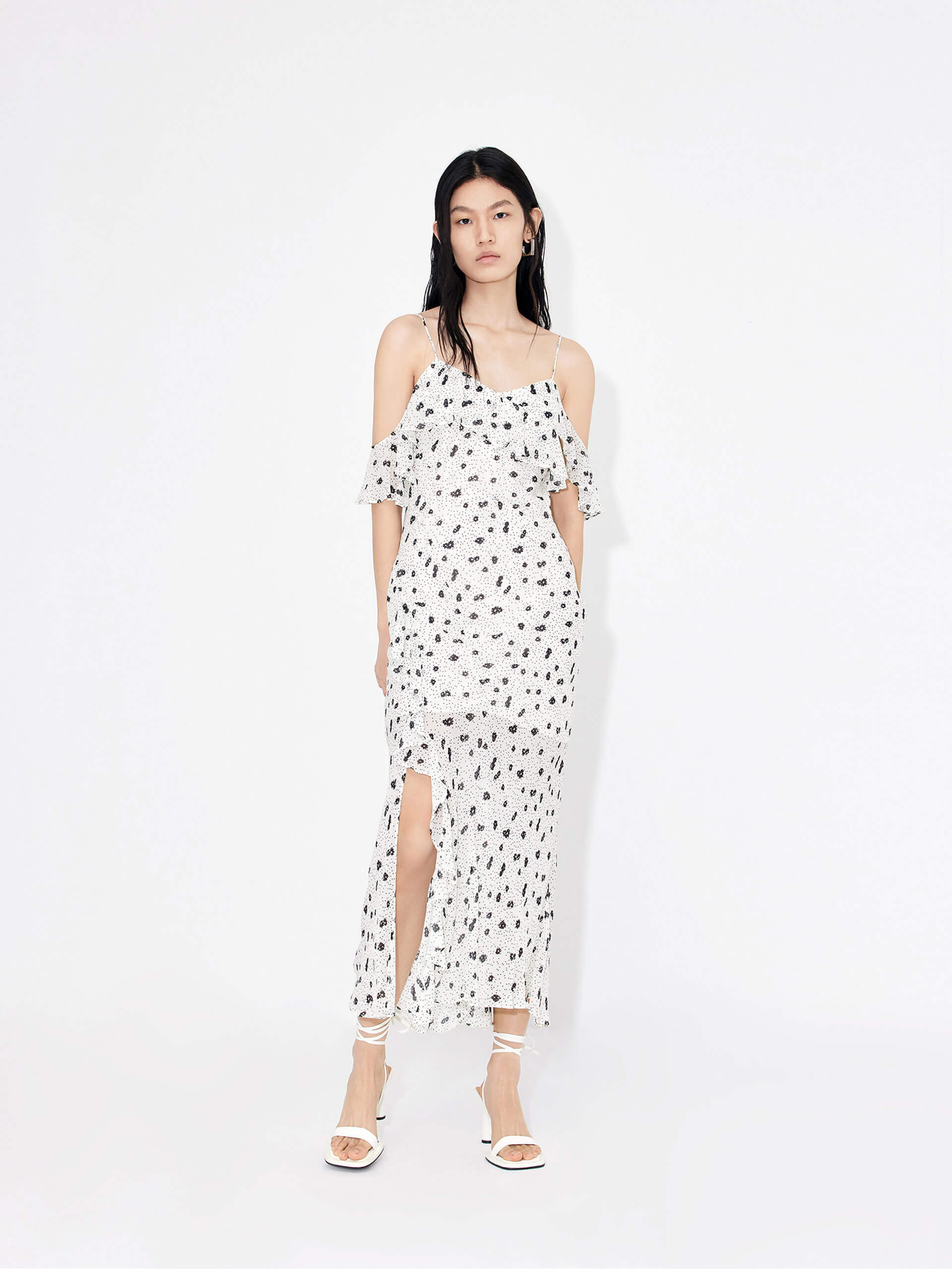 MO&Co. Women's Polka Dot Tulle Slip Dress in White features eye-catching frill details, floral/polka-dot print, adjustable straps and a front slit combine to make a stand-out look for your wardrobe.