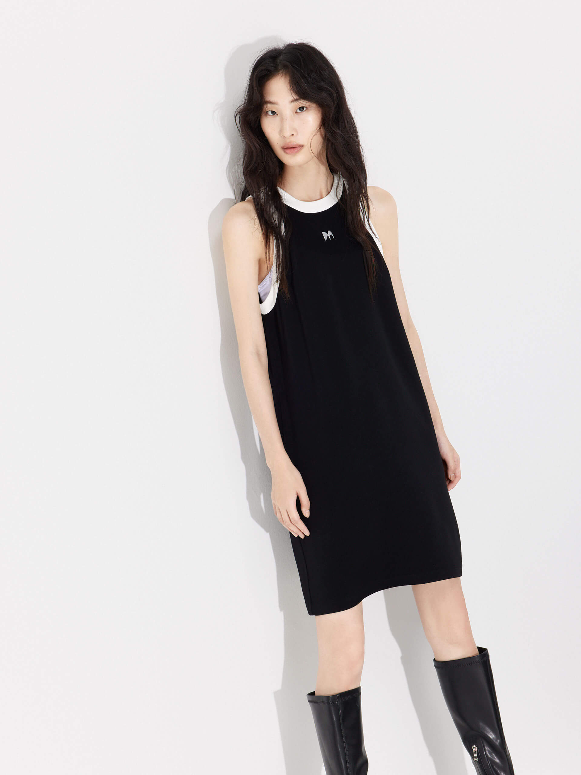 MO&Co. Women's Contrasting Trim Mini Dress, crafted from an acetate blend material. Its A-line tank dress, side pockets and contrasting trim accents flatter the silhouette and provide a perfect look for any occasion.