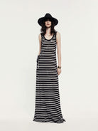 MO&Co. Noir Women's Striped Linen Maxi Tank Dress. Made from breathable linen, this dress features a U-shaped neckline with distressed details for a casual-chic vibe.