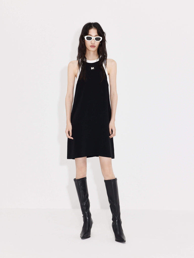 MO&Co. Women's Contrasting Trim Mini Dress, crafted from an acetate blend material. Its A-line tank dress, side pockets and contrasting trim accents flatter the silhouette and provide a perfect look for any occasion.
