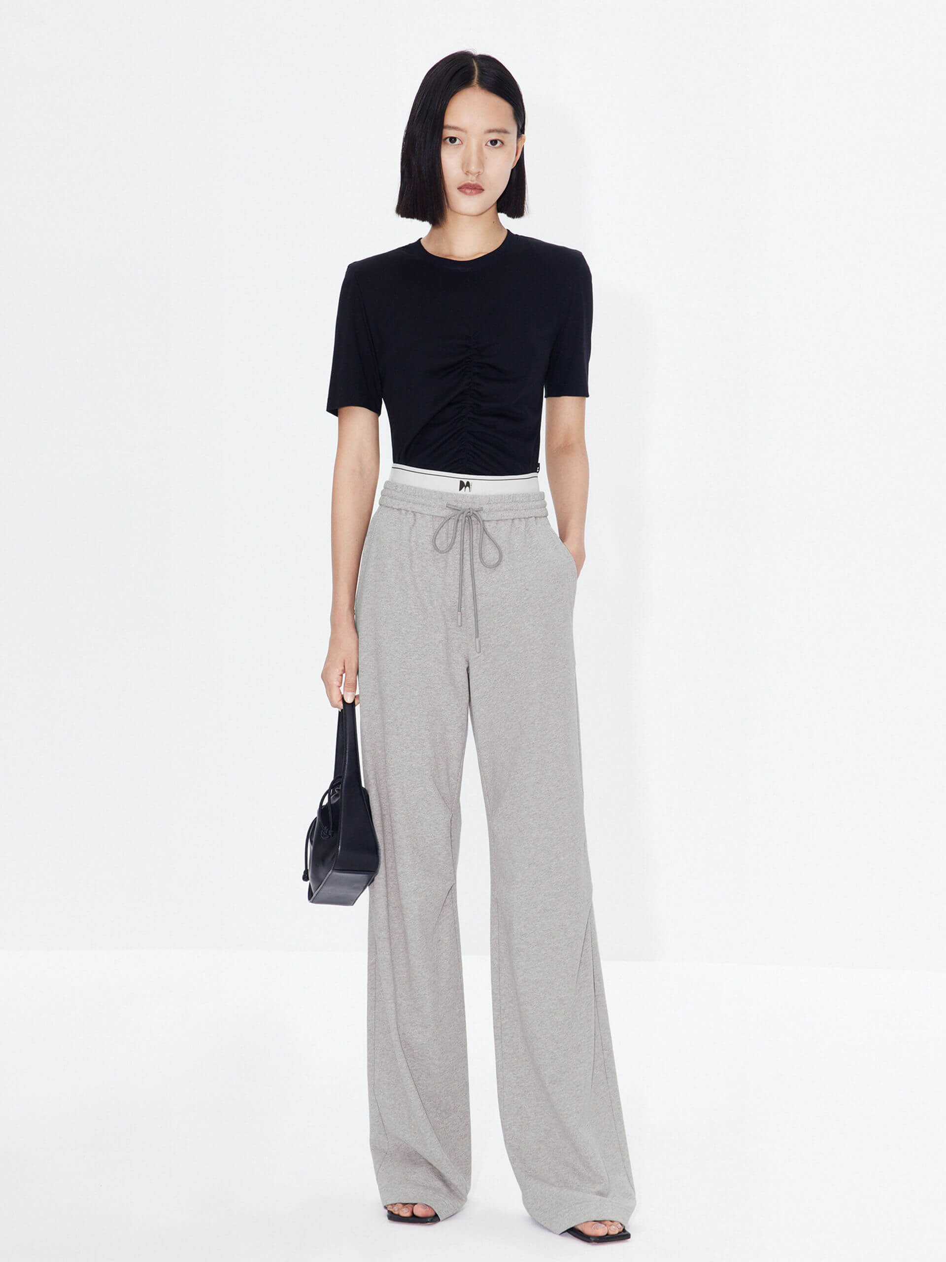 MO&Co. Women's Double Waistband Wide-leg Casual Trousers in Cotton - Grey. Made from breathable cotton fabric, these sweatpants offer a relaxed, stylish fit complete with wide legs & slant pockets. Contrast double waistbands & letter details give them added style.