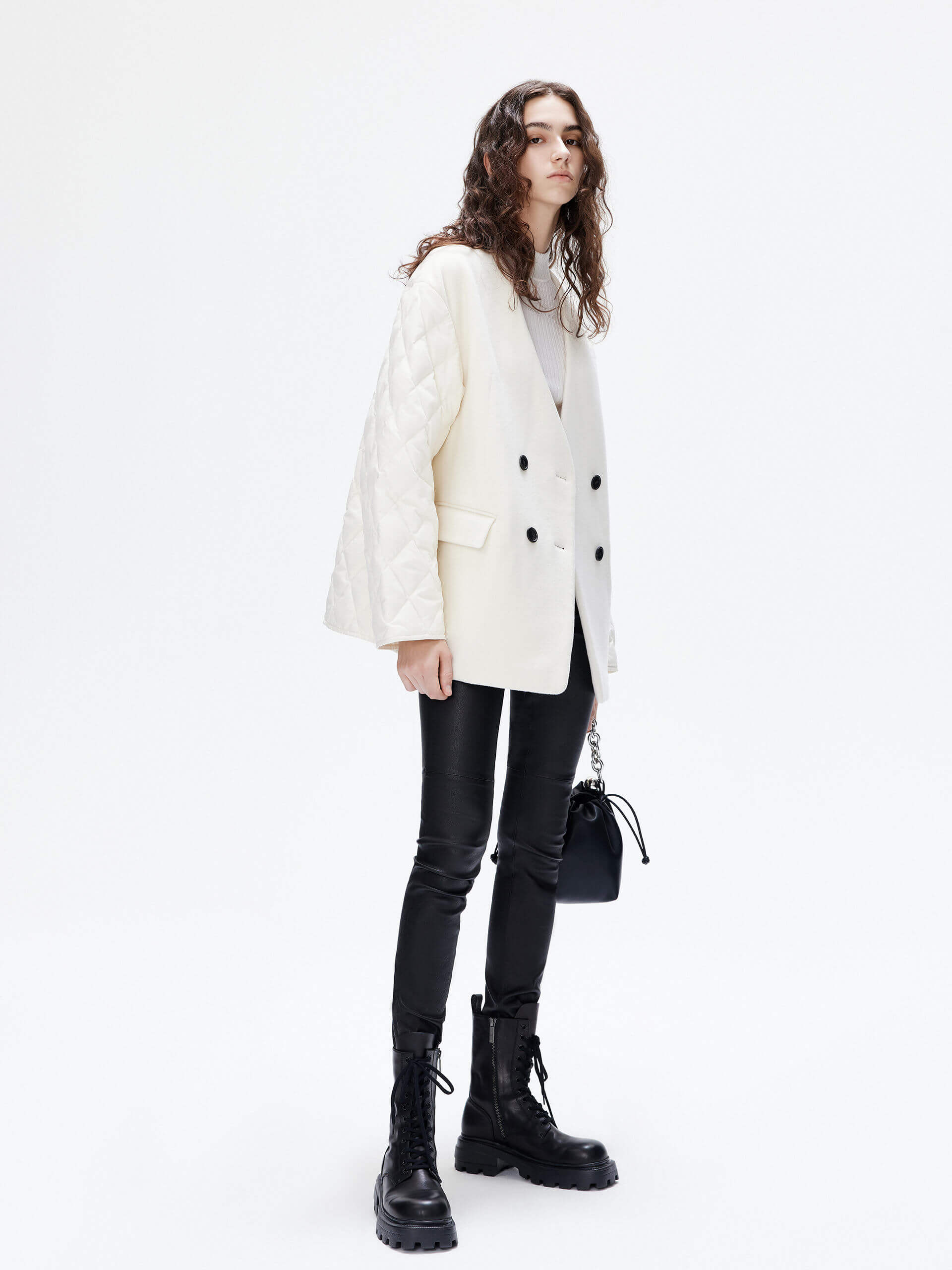 MO&Co. Women's V-neck Quilted Shell Wool Blend Jacket in White, featuring a button closure and flap pocket design. Wool panel front , quilted shell sleeves and back add a unique touch and extra warmth. 