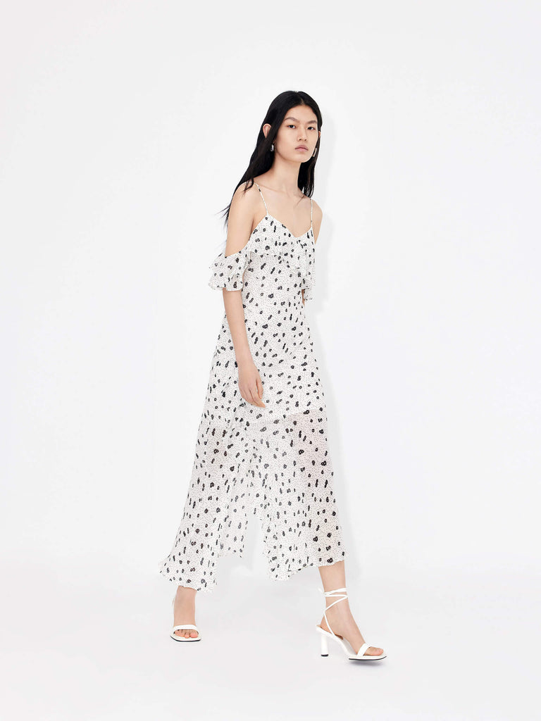 MO&Co. Women's Polka Dot Tulle Slip Dress in White features eye-catching frill details, floral/polka-dot print, adjustable straps and a front slit combine to make a stand-out look for your wardrobe.