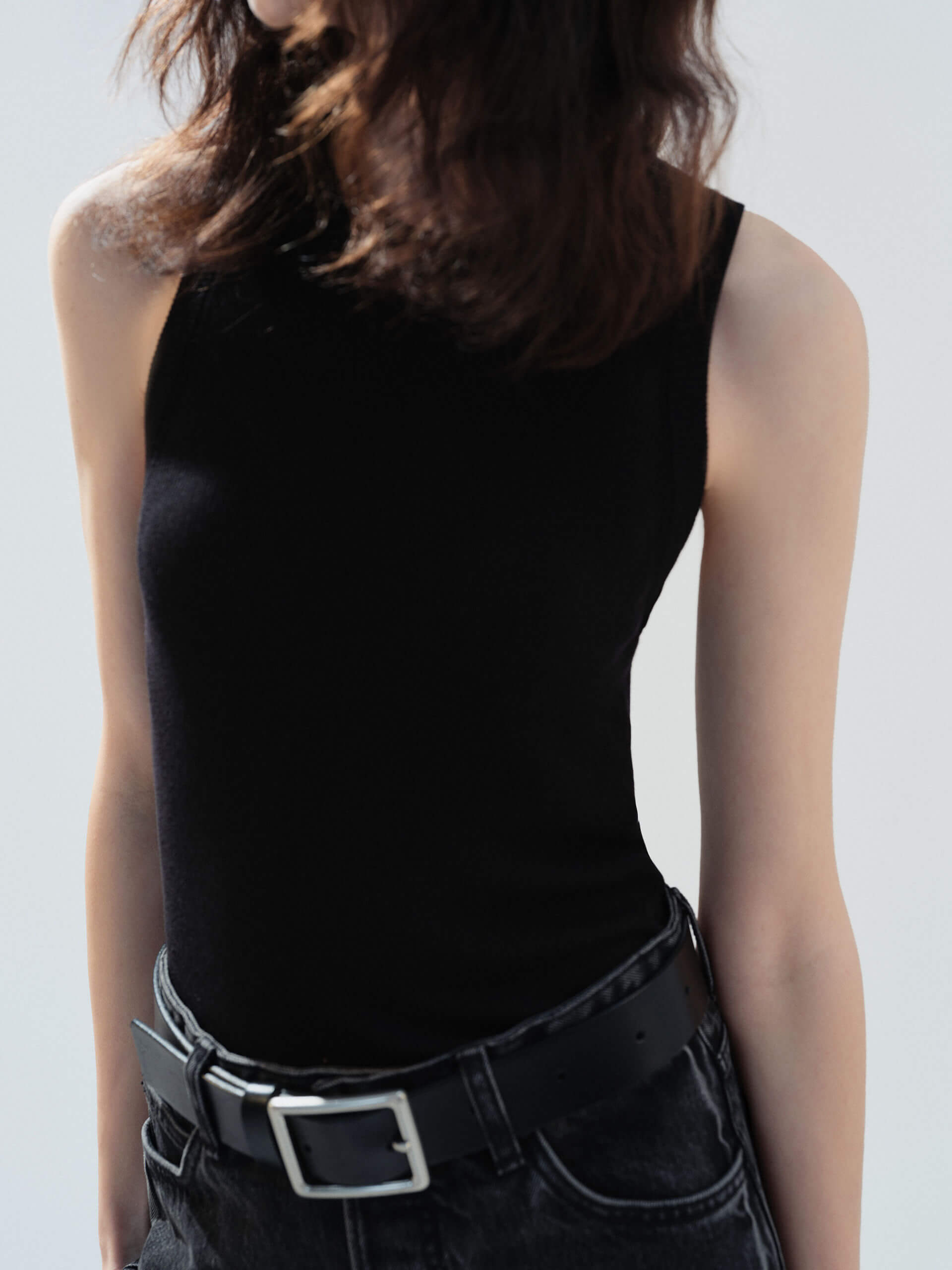 MO&Co. Noir Women's Black Ribbed Tank Top in Black | Versatile and Stylish crafted from a soft organic cotton-blend jersey with a slim stretchy ribbed tight fit. 