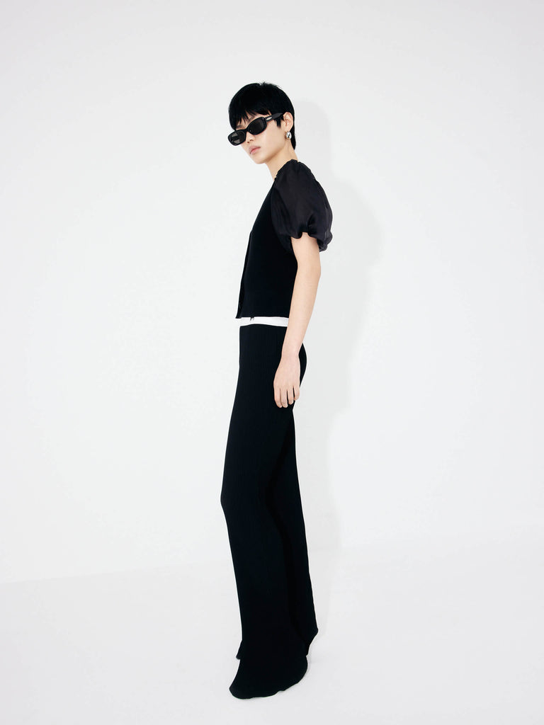 MO&Co's Structured Contrast Detail Pants in Black. Featuring a contrasting elastic waistband and structured texture fabric, these pants are sure to elevate any look.