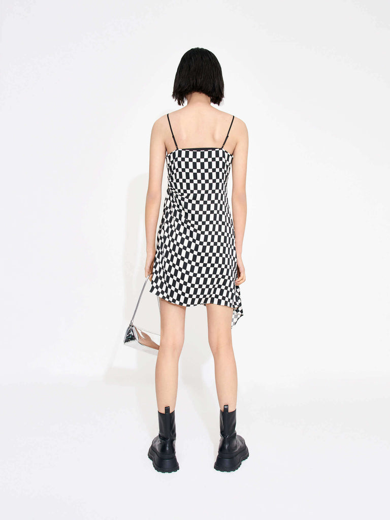 MO&Co. Women's Gathered Detail Asymmetric Plaid Mini Dress in Black and White features a straight neckline, mini length & asymmetric hem designs for a flattering fit. Pleated side sweeps add texture for an interesting look. Perfect for cocktail and evening out.