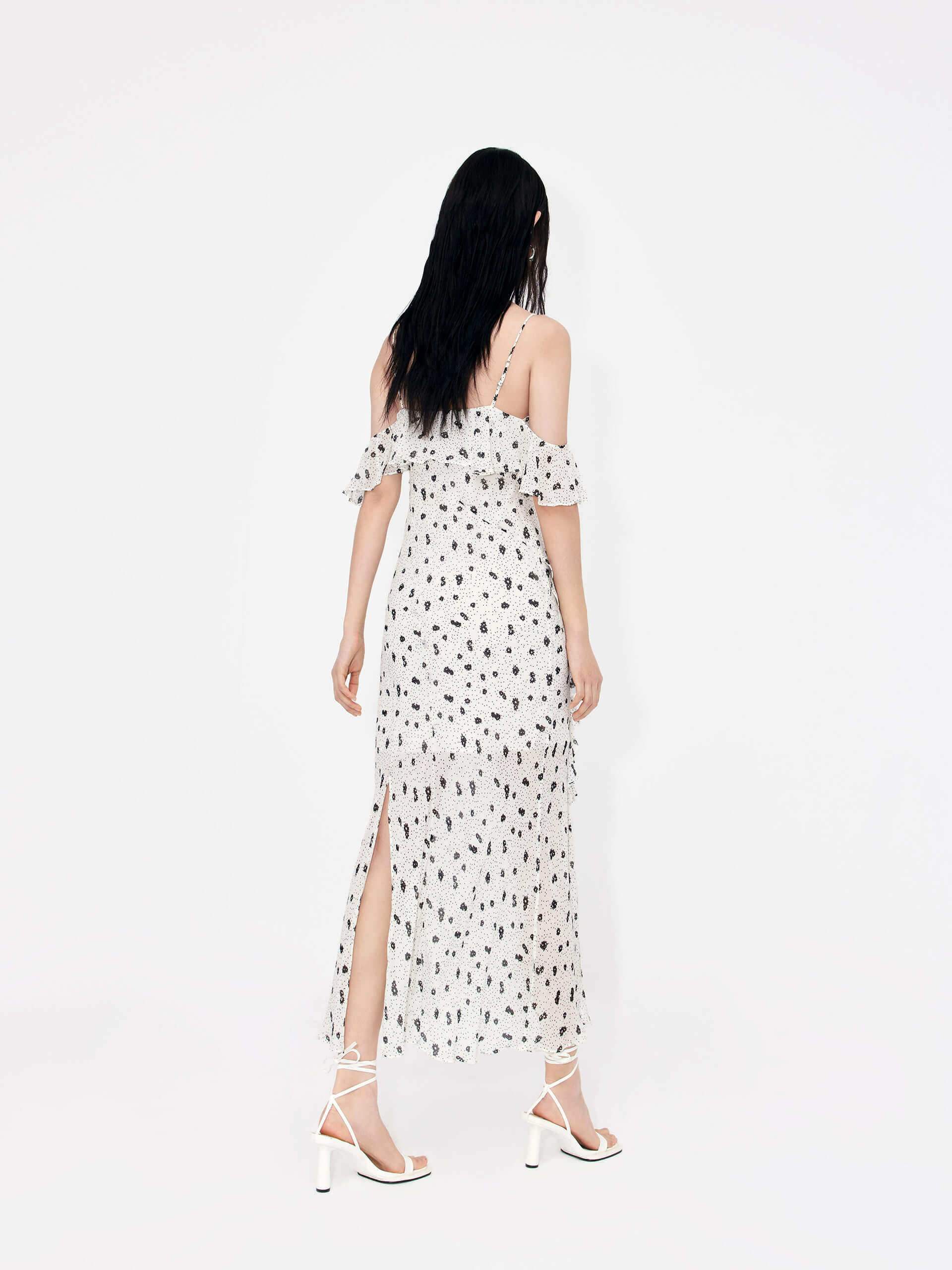 MO&Co. Women's Polka Dot Tulle Slip Dress in White features eye-catching frill details, floral/polka-dot print, adjustable straps and a front slit combine to make a stand-out look for your wardrobe.