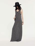 MO&Co. Noir Women's Striped Linen Maxi Tank Dress. Made from breathable linen, this dress features a U-shaped neckline with distressed details for a casual-chic vibe.