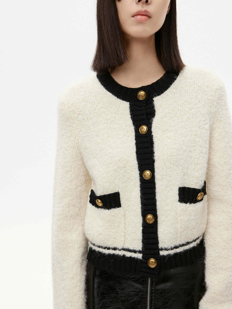 MO&Co. Women's Cropped Boucle Alpaca & Wool Blend Knit Cardigan Cream with Long Sleeves, crew neck and contrast trims.