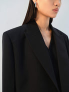 MO&Co. Women's Cropped Double-Breasted Luxury Wool Blazer in Black with padded shoulders