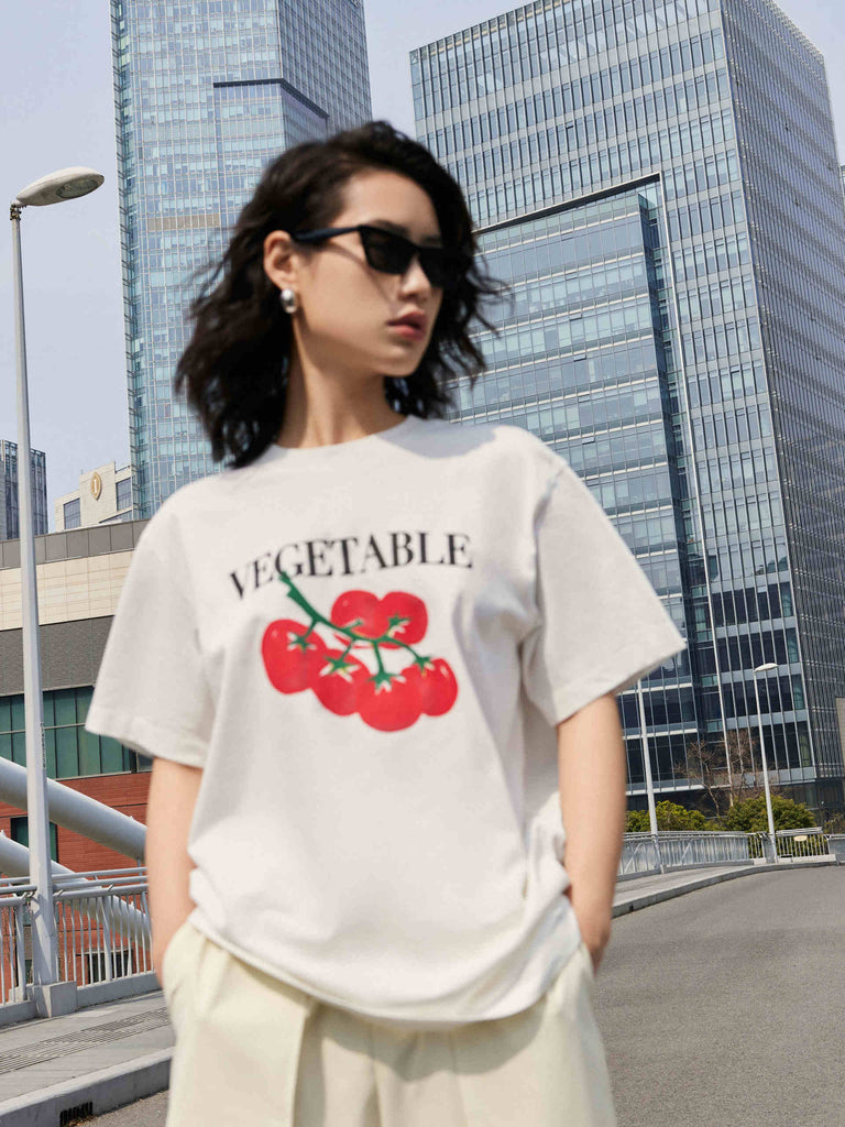 MO&Co. Women's Vegetable Print Cotton White T-Shirt. Crafted from breathable, anti-bacterial cotton, this regular fit garment is designed with a dropped shoulder and tomato print that will keep you comfortable and fashionable all day.